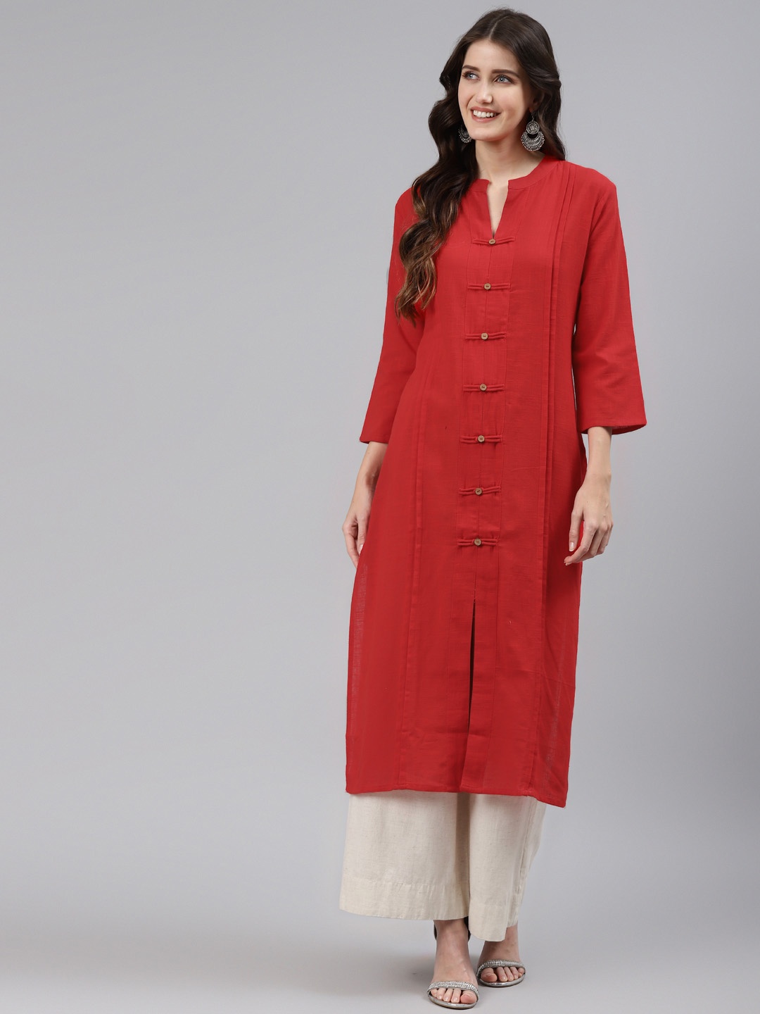 

Readiprint Fashions Women Red Solid Pure Cotton Kurta With Multiple Slits