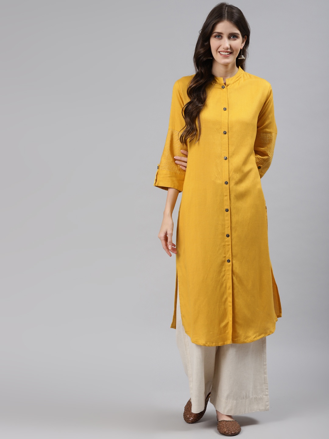 

Readiprint Fashions Women Yellow Solid Zari Work Kurta