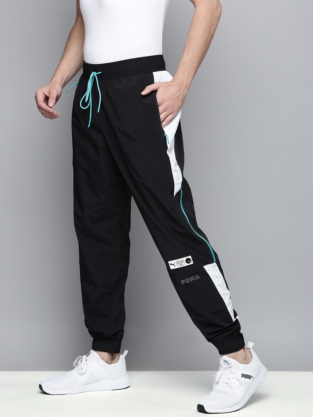 

Puma Men Black Graphical Printed Regular Football Joggers