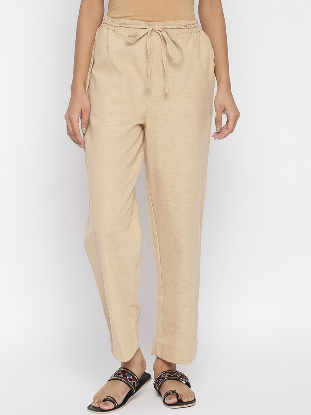 

Fabindia Women Beige Solid Cotton Trousers