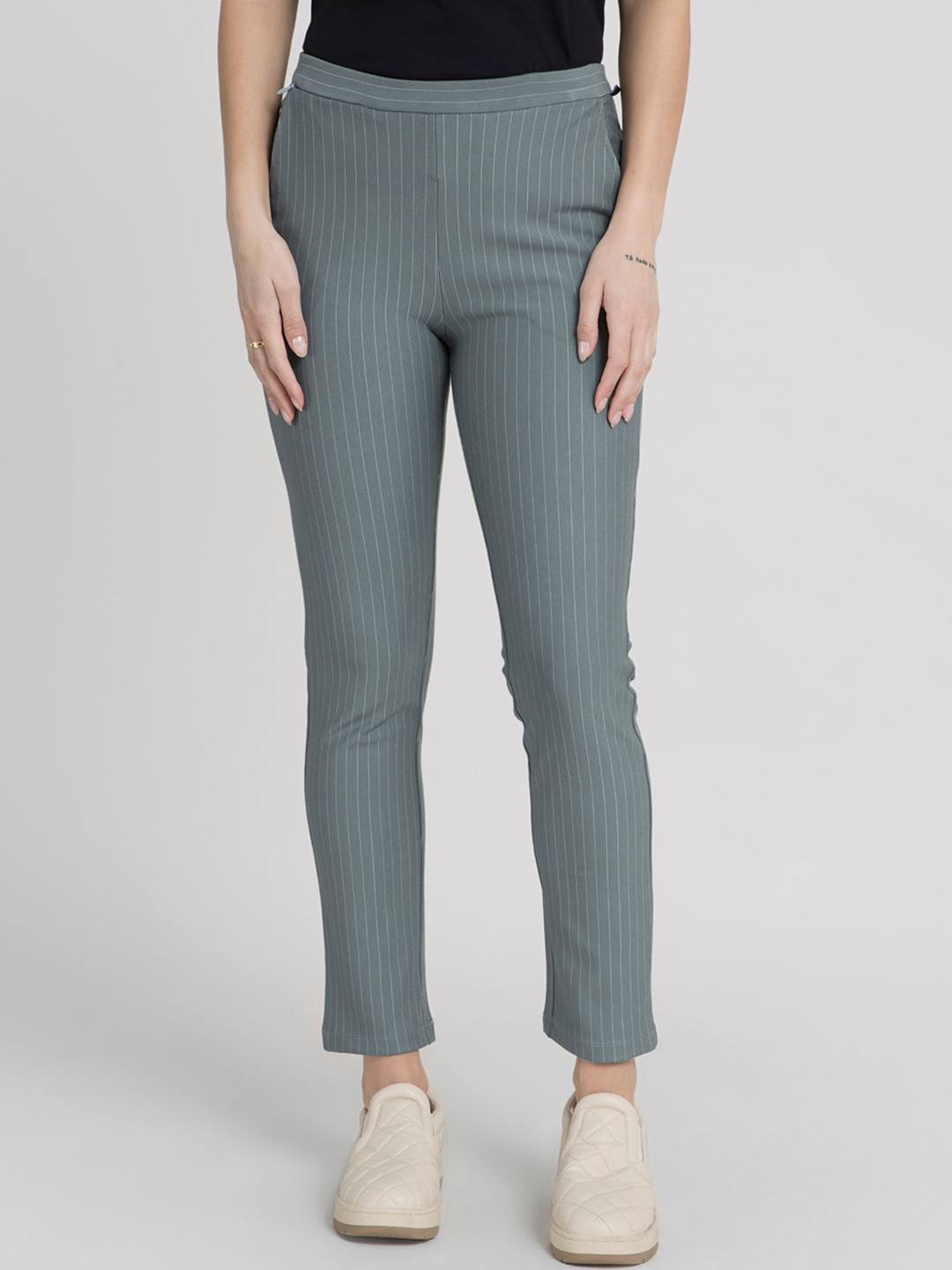 

FableStreet Women Green Striped LivIn Slim Fit Trousers
