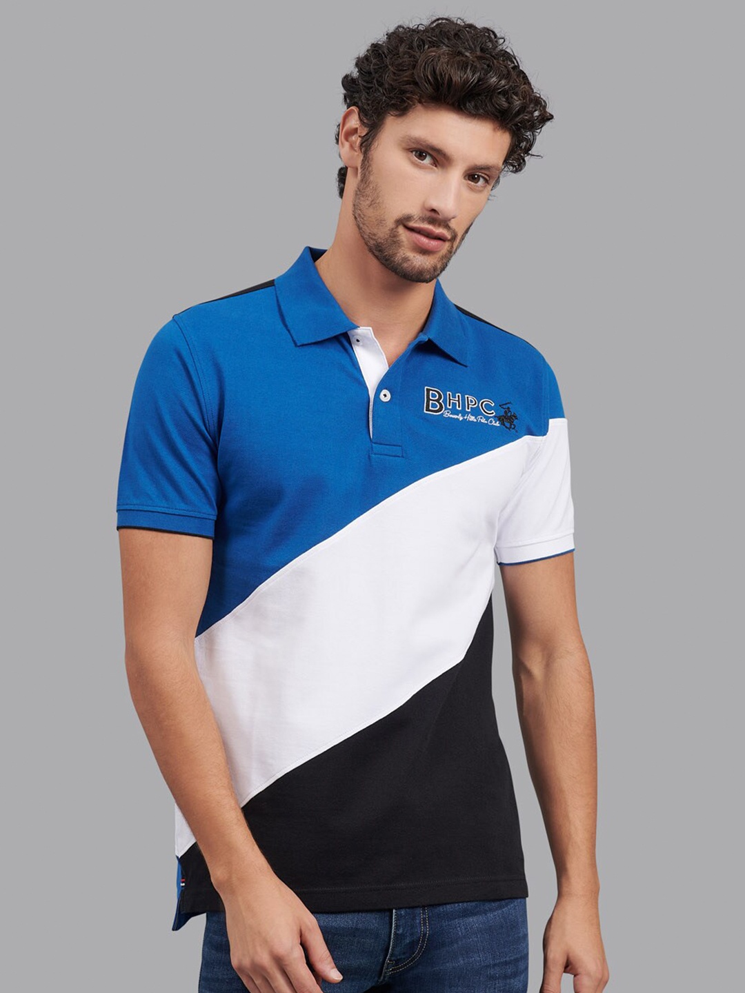 

Beverly Hills Polo Club Men Blue & White Colourblocked Polo Collar T-shirt