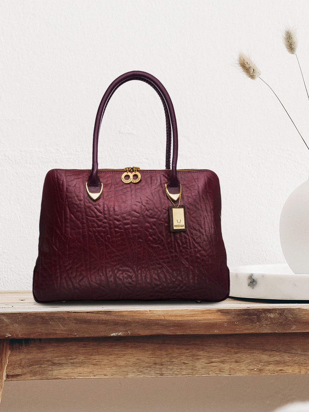 

Hidesign Purple Textured Leather Structured Handheld Bag