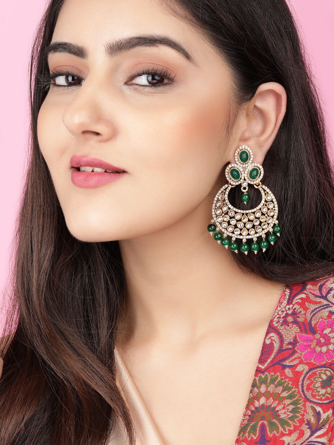 

Anouk Gold-Plated & Green Kundan Studded Crescent Shaped Chandbalis