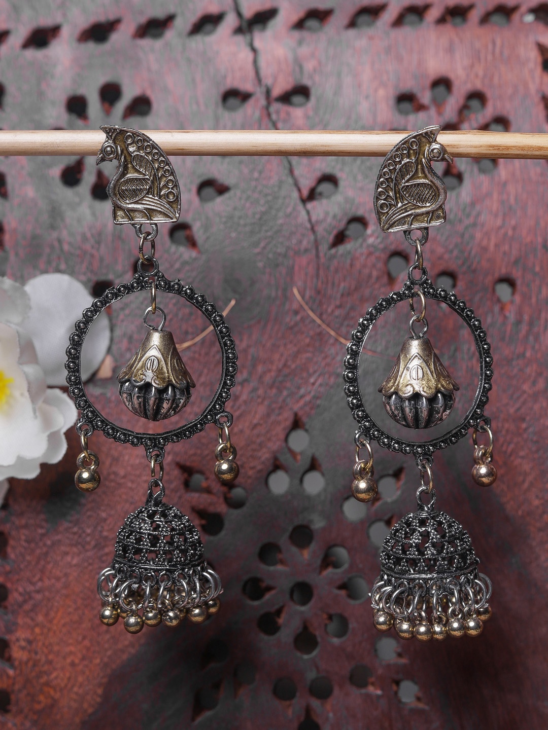 

DIVA WALK Silver-Toned & Gold-Toned Peacock Shaped Jhumkas Earrings