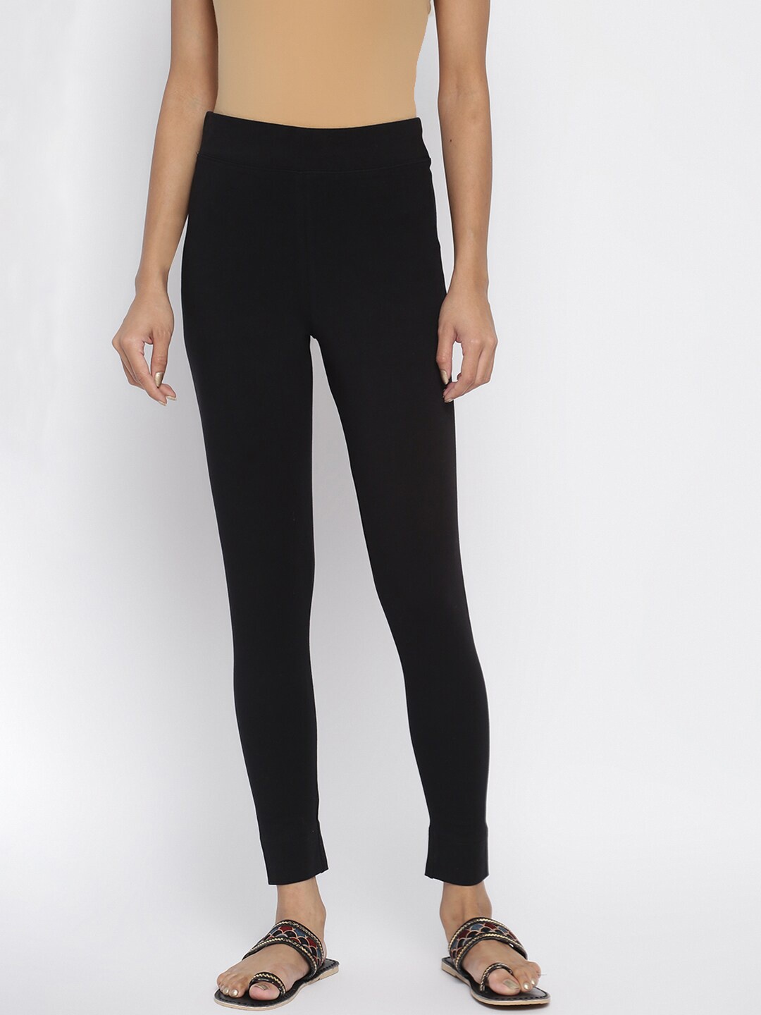 

Fabindia Women Black Solid Cotton Leggings