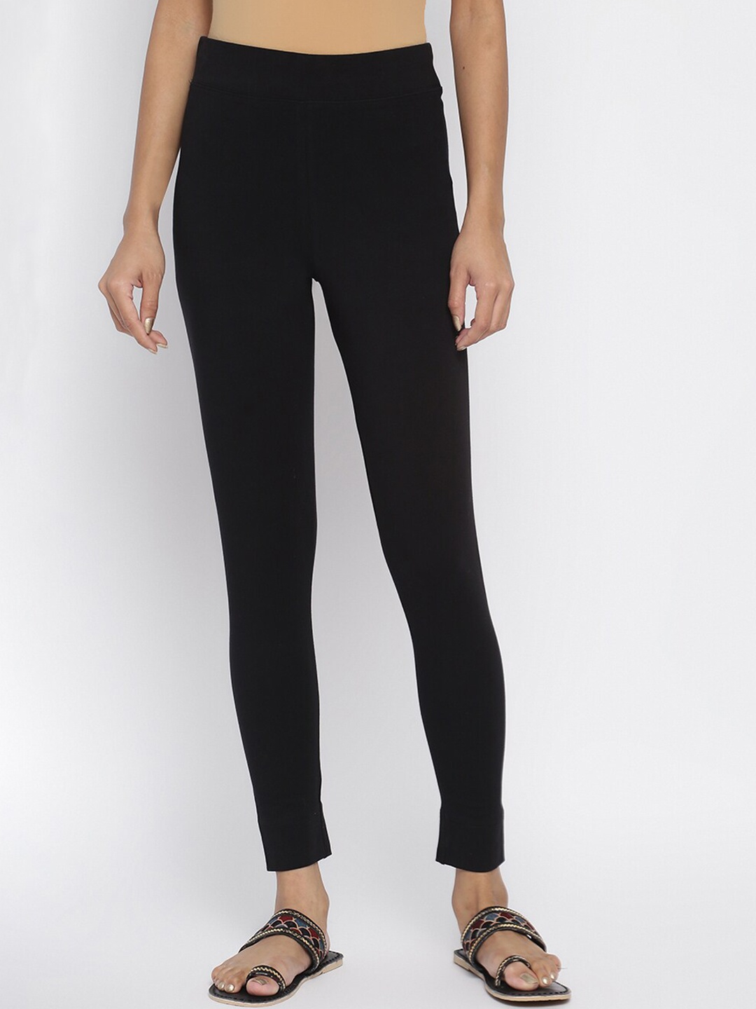 

Fabindia Women Black Solid Cotton Ankle-Length Leggings