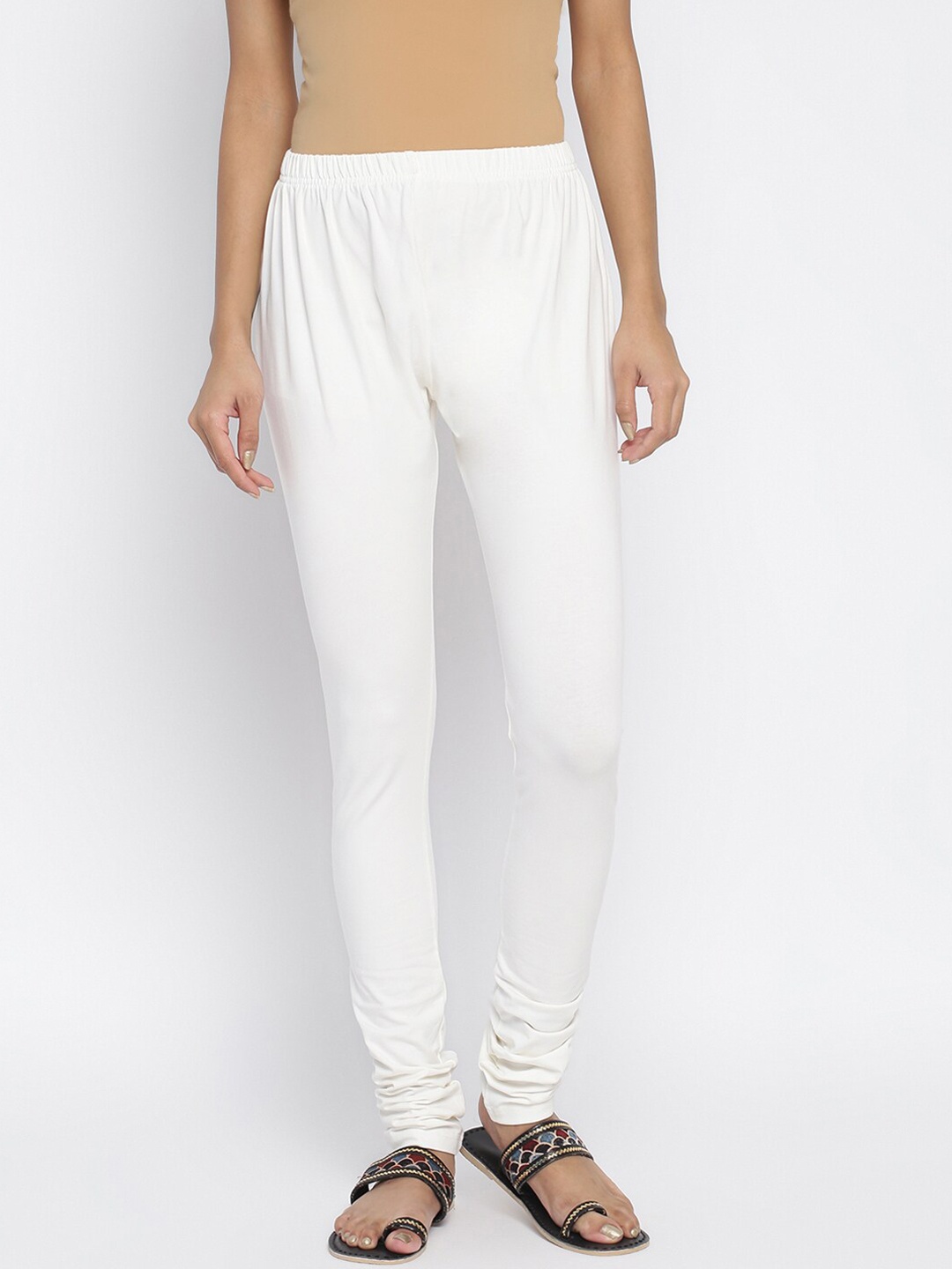 

Fabindia Women White Solid Mid Rise Churidar