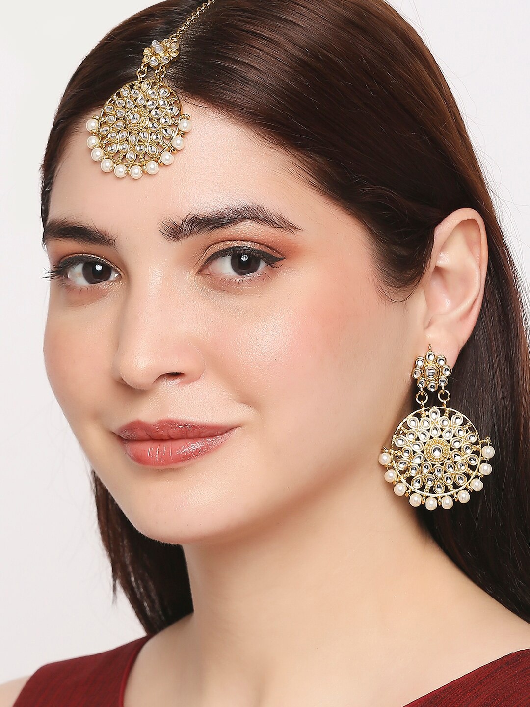 

OOMPH Gold Toned & White Jadau Kundan & Pearl Maangtika Set with Earrings