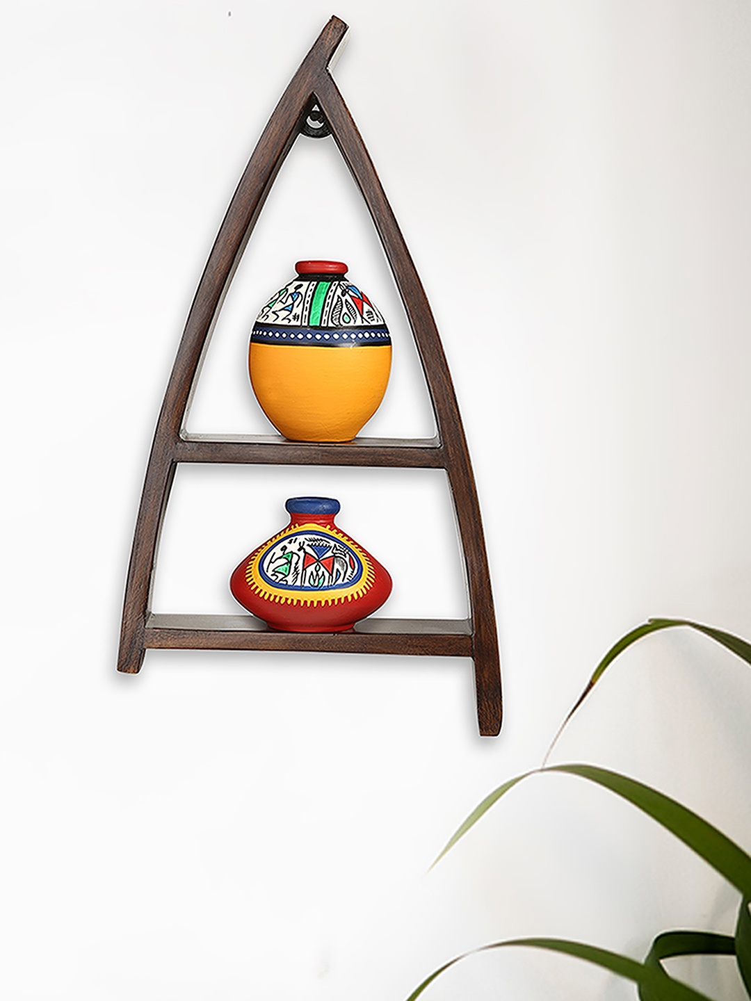 

ExclusiveLane Set of 2 Yellow & Red Warli Terracotta Showpieces with Wooden Wall Shelves