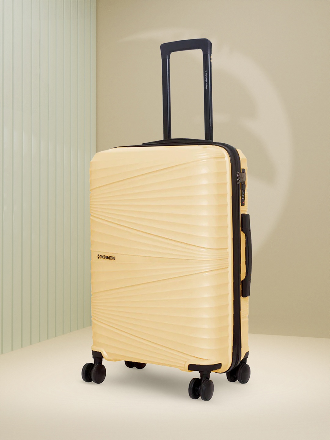 

Nasher Miles Mumbai Solid Santorini Hard-Sided Cabin Trolley Bag, Yellow