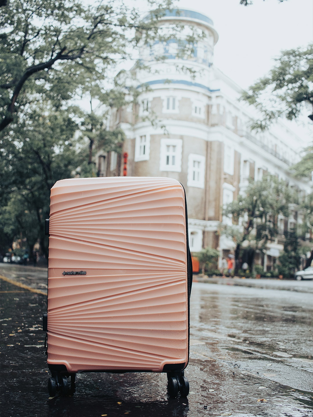 

Nasher Miles Mumbai Solid Hard Large Trolley Bag - 75 cm, Peach