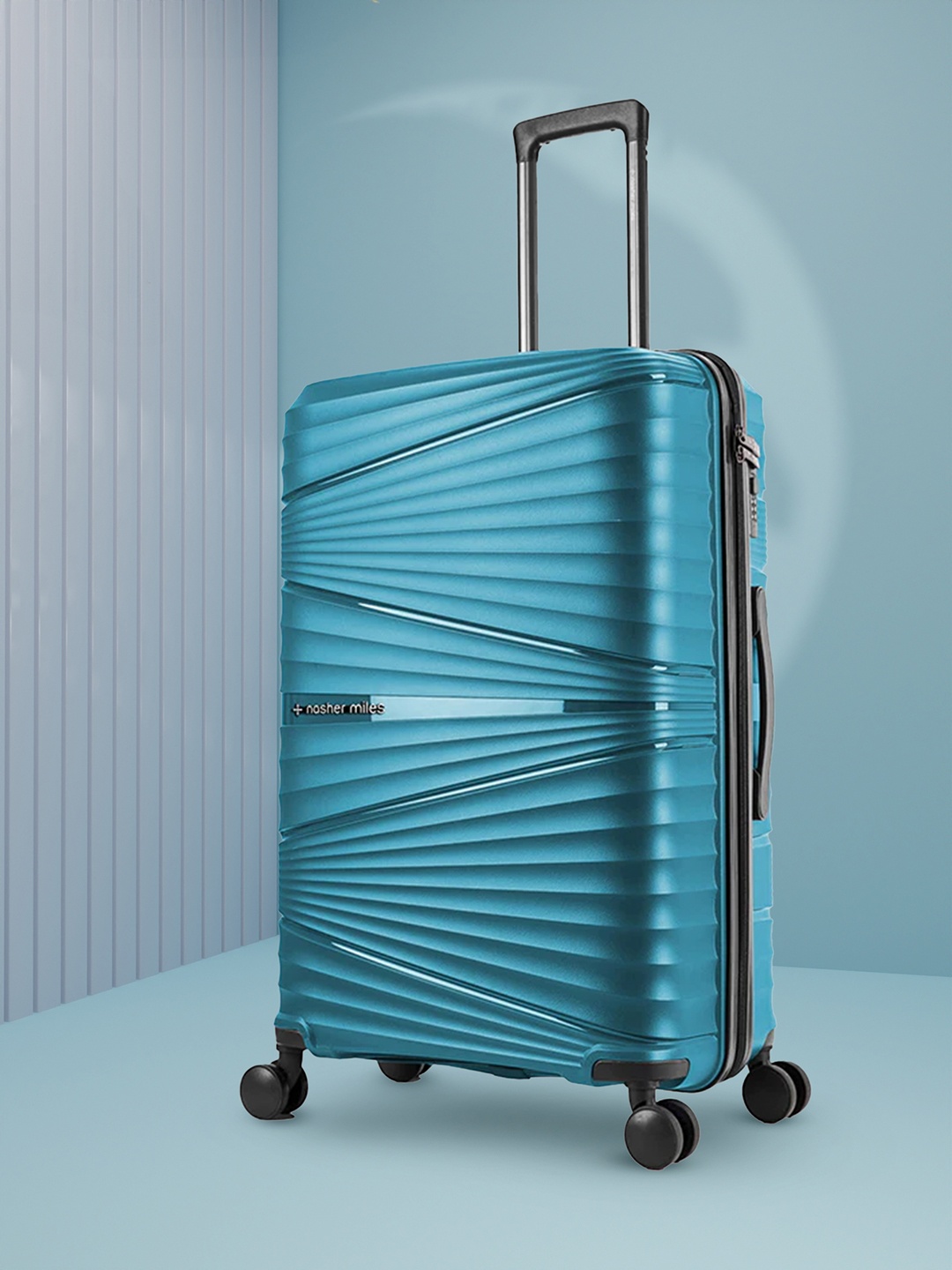 

Nasher Miles Mumbai Textured Hard-Sided Large Trolley Suitcase, Teal