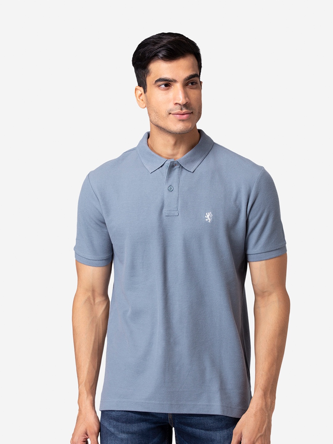 

Red Tape Men Blue Solid Polo Collar T-shirt