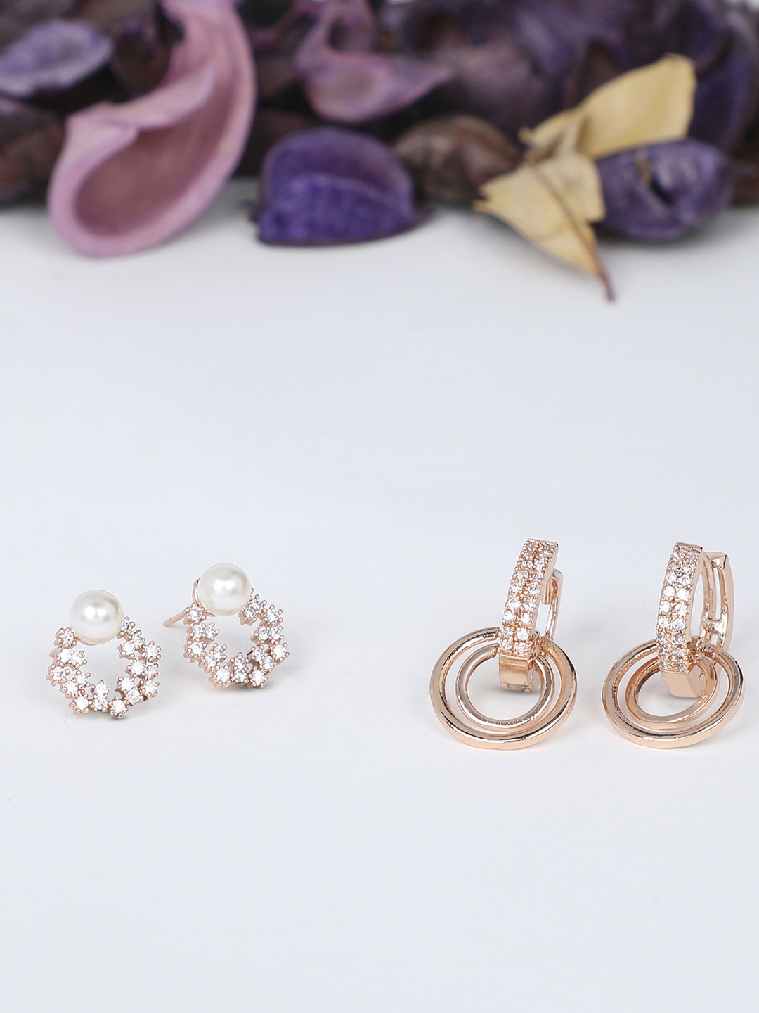 

Zaveri Pearls Rose Gold Contemporary Studs Earrings