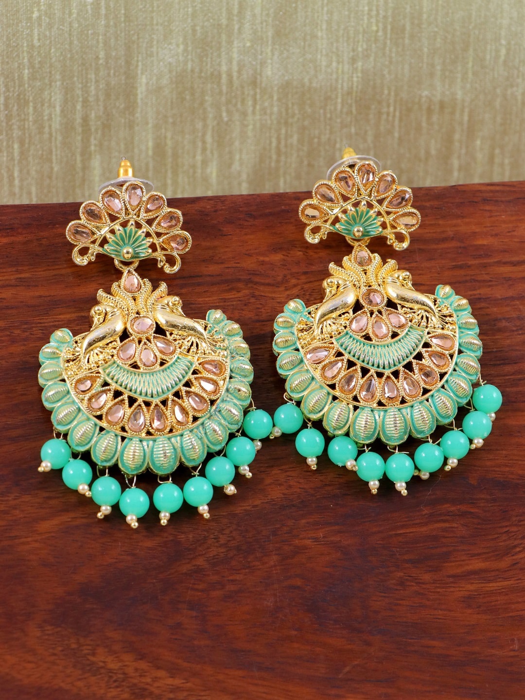 

Crunchy Fashion Gold-Plated & Green Peacock Shaped Chandbalis Earrings