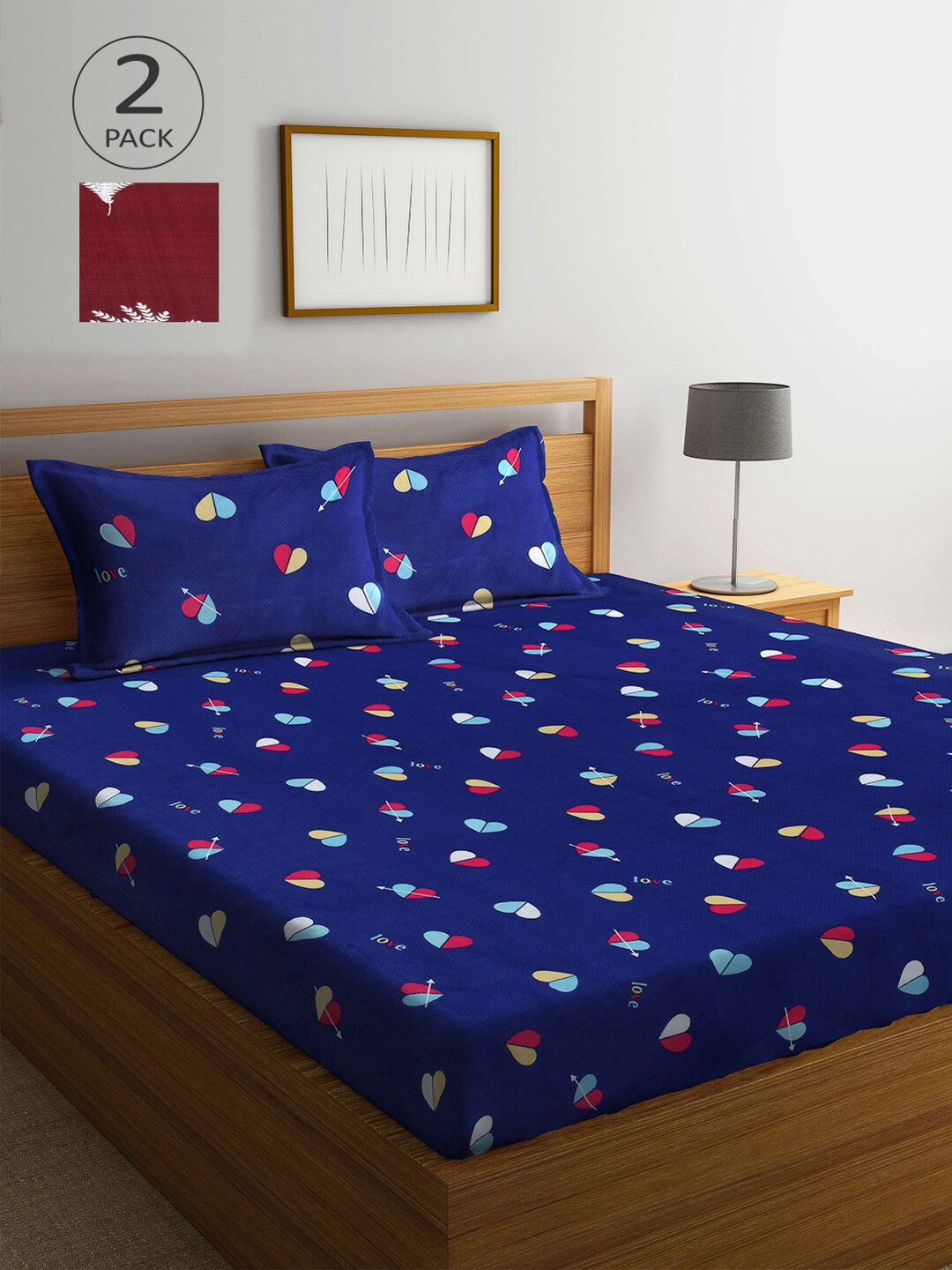 

Arrabi Set Of 2 Blue & Maroon Graphic 300 TC 2 King Bedsheet with 4 Pillow Covers
