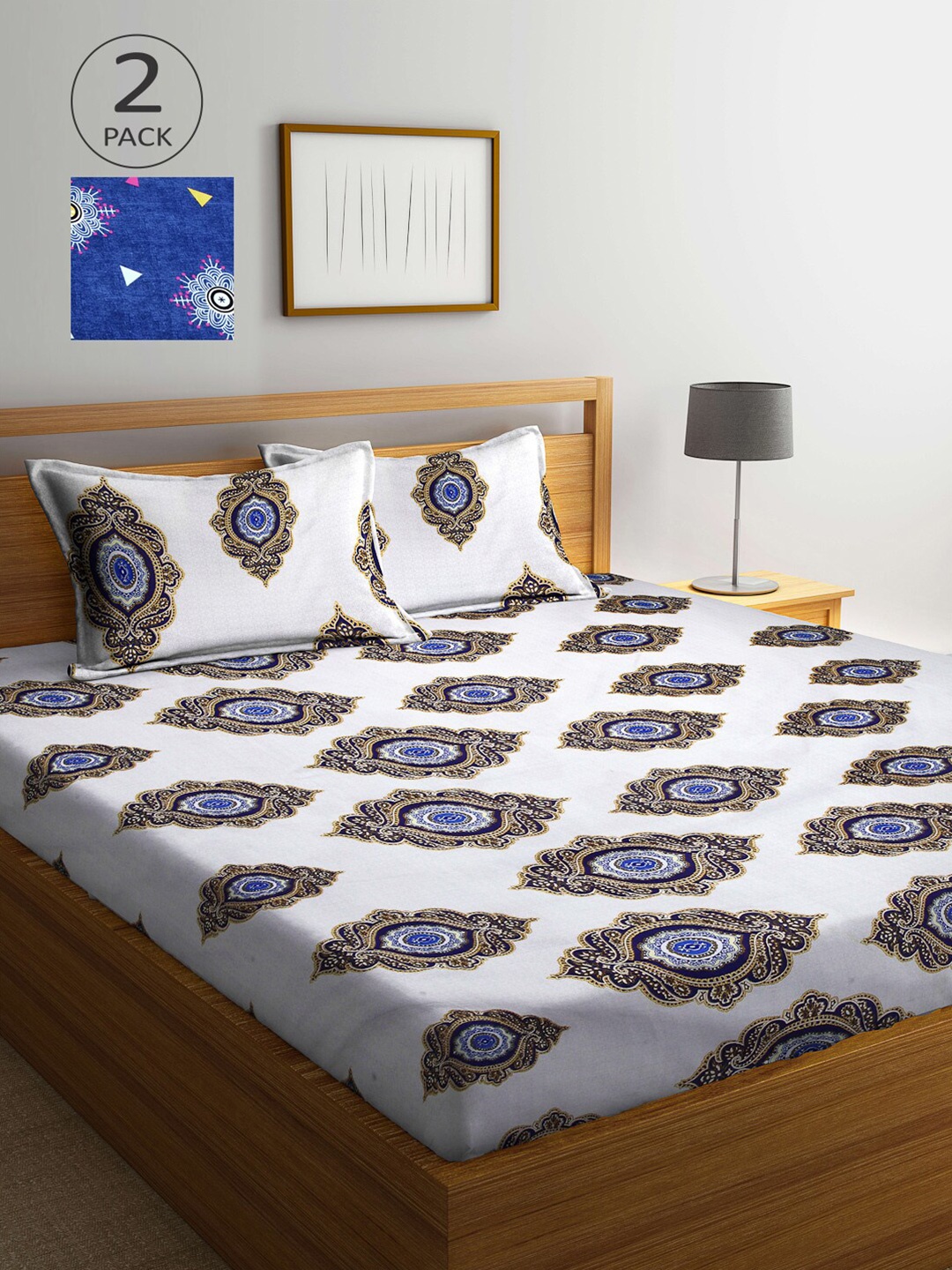 

Arrabi Blue & White Ethnic Motifs 300 TC 2 King Bedsheet with 4 Pillow Covers