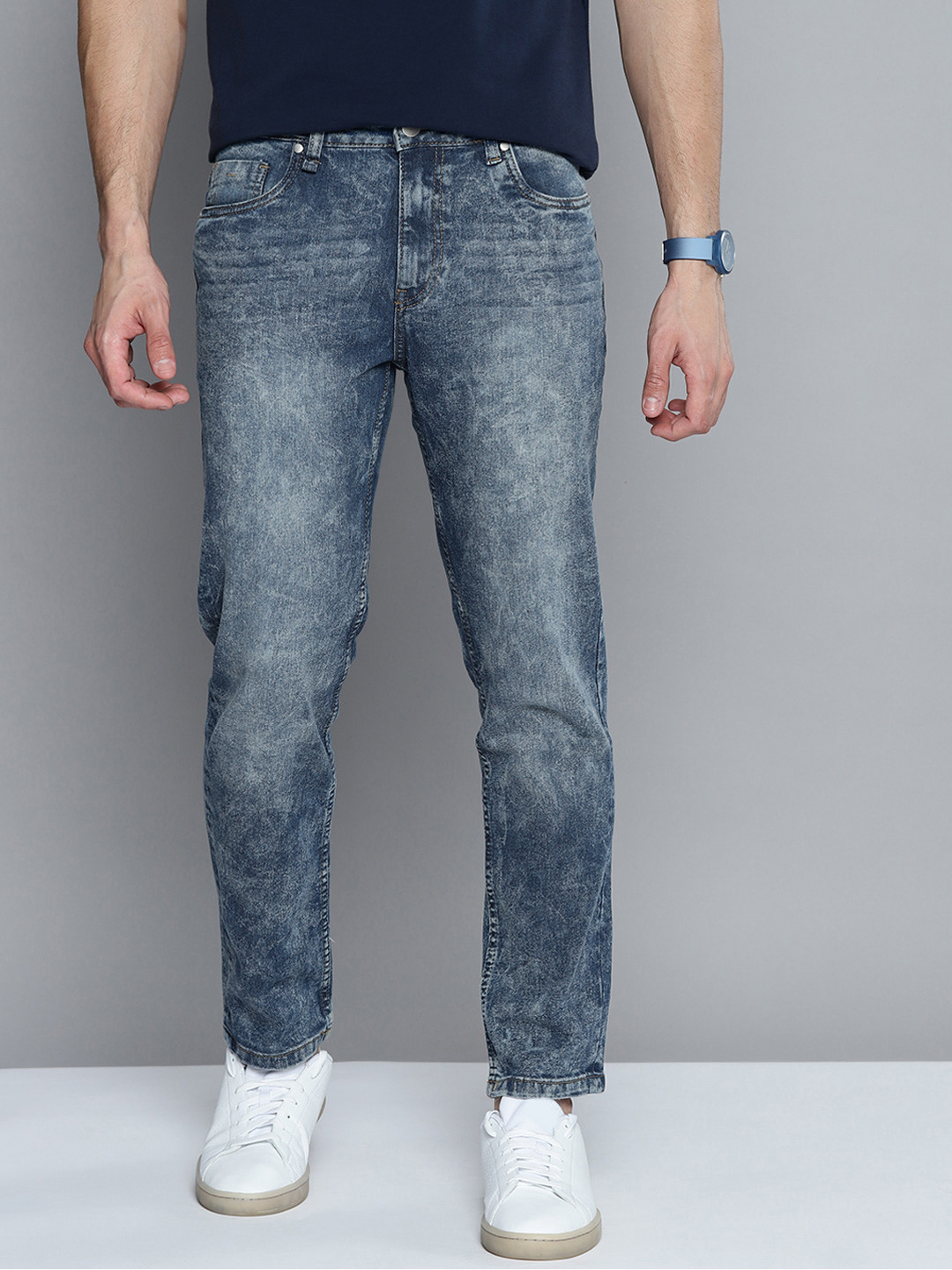 

Mast & Harbour Men Blue Tapered Fit Mildly Distressed Acid Wash Stretchable Jeans