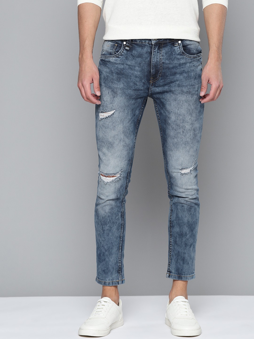 

Mast & Harbour Men Blue Skinny Fit Mildly Distressed Light Fade Stretchable Jeans