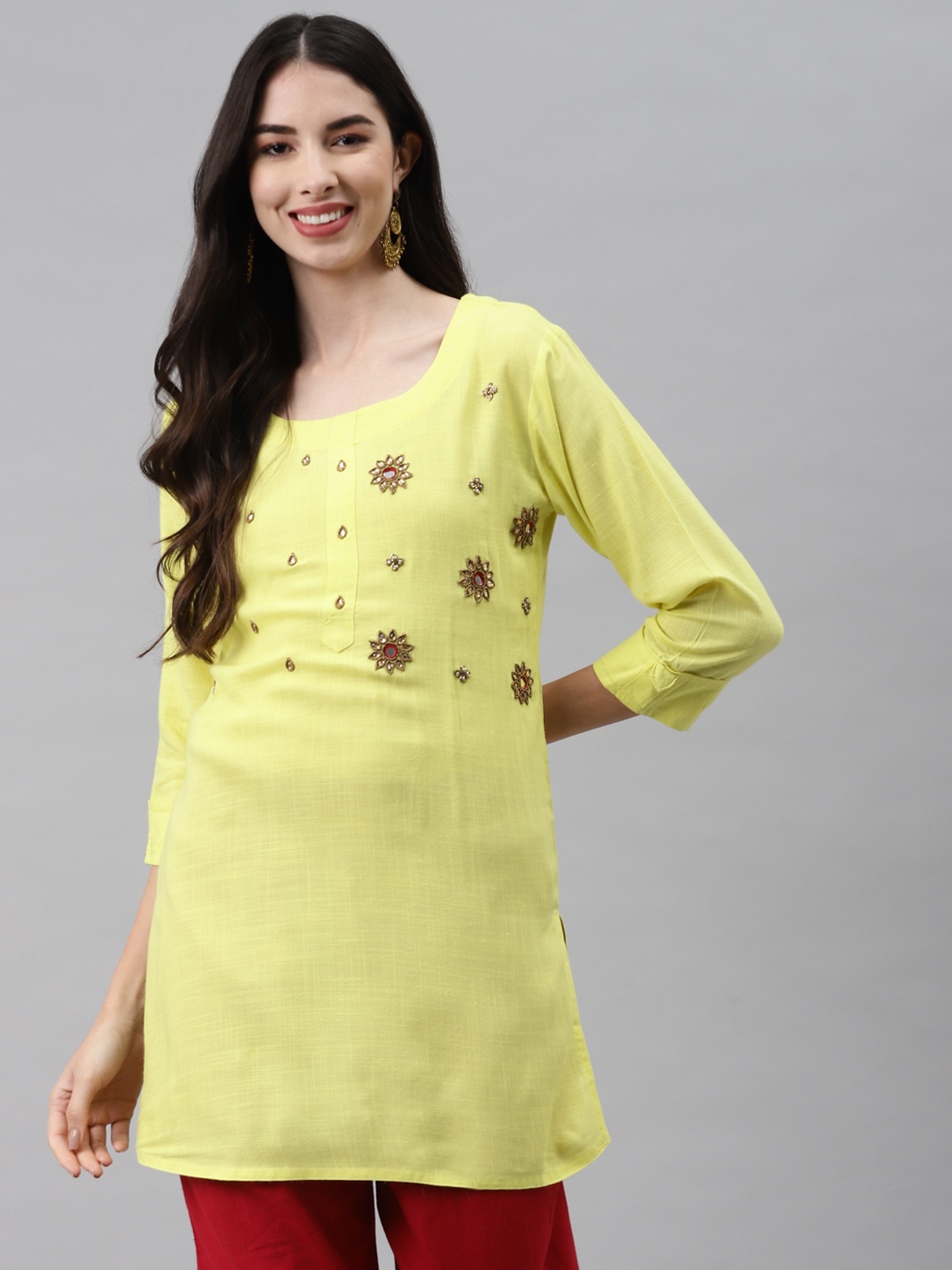 

HIGHLIGHT FASHION EXPORT Yellow Floral Embellished Regular Top