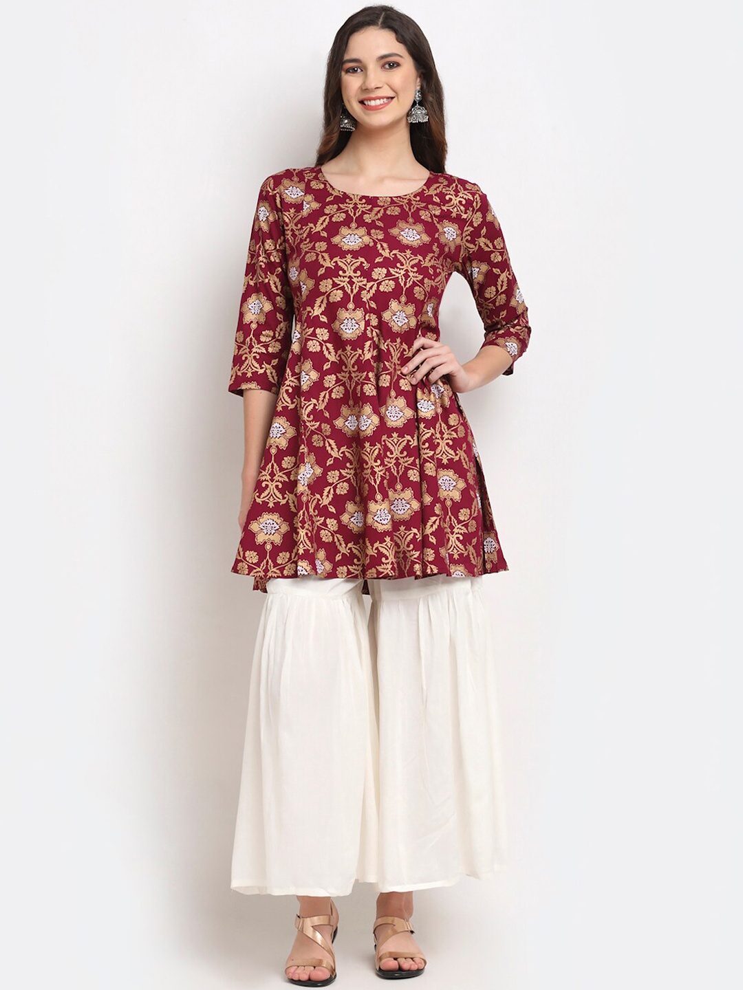 

Rudra Bazaar Women Maroon Floral Printed Empire Kurta with Sharara