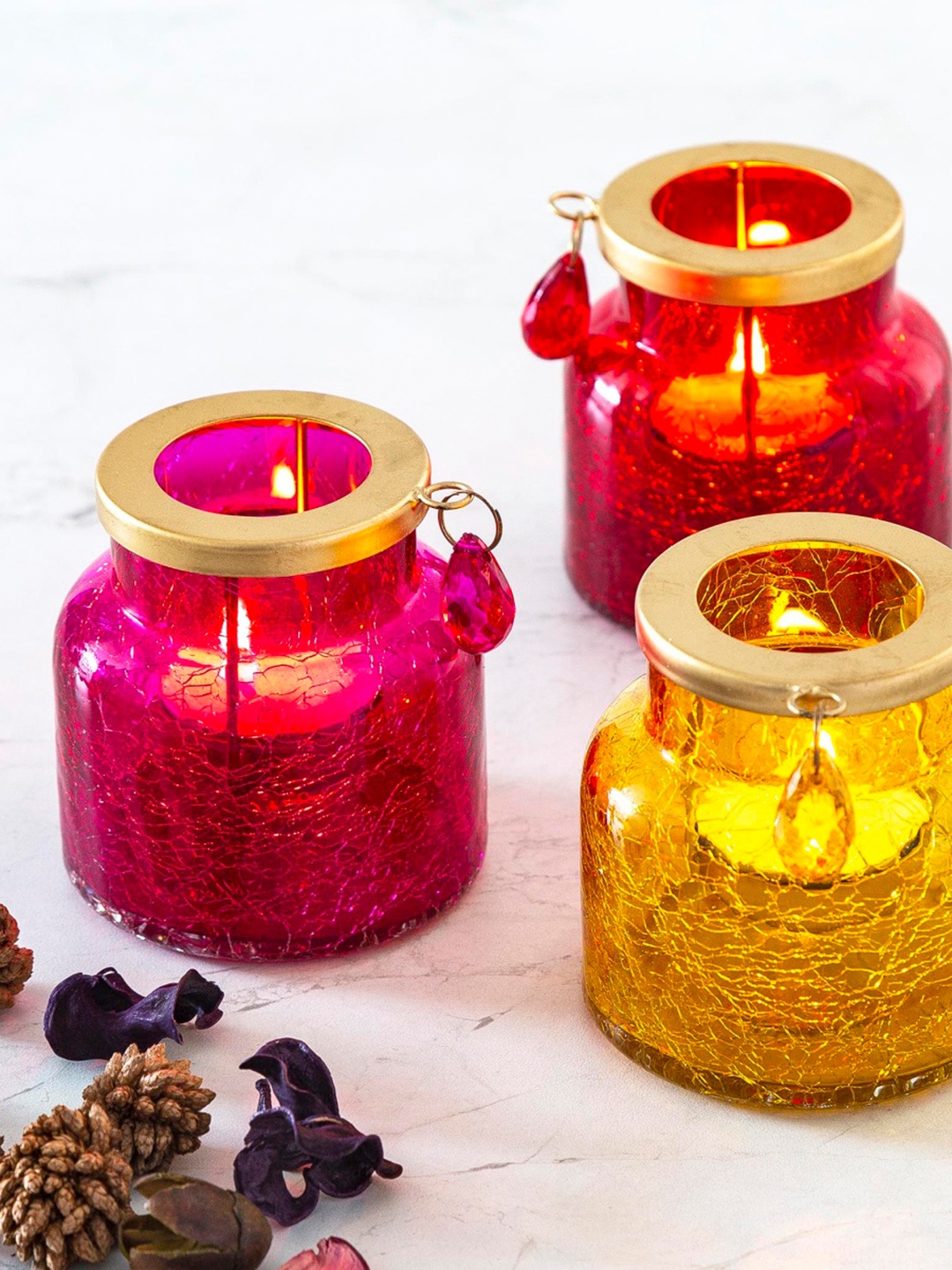 

Home Centre Set Of 3 Red & Transparent Glass Crackled Candle Holder