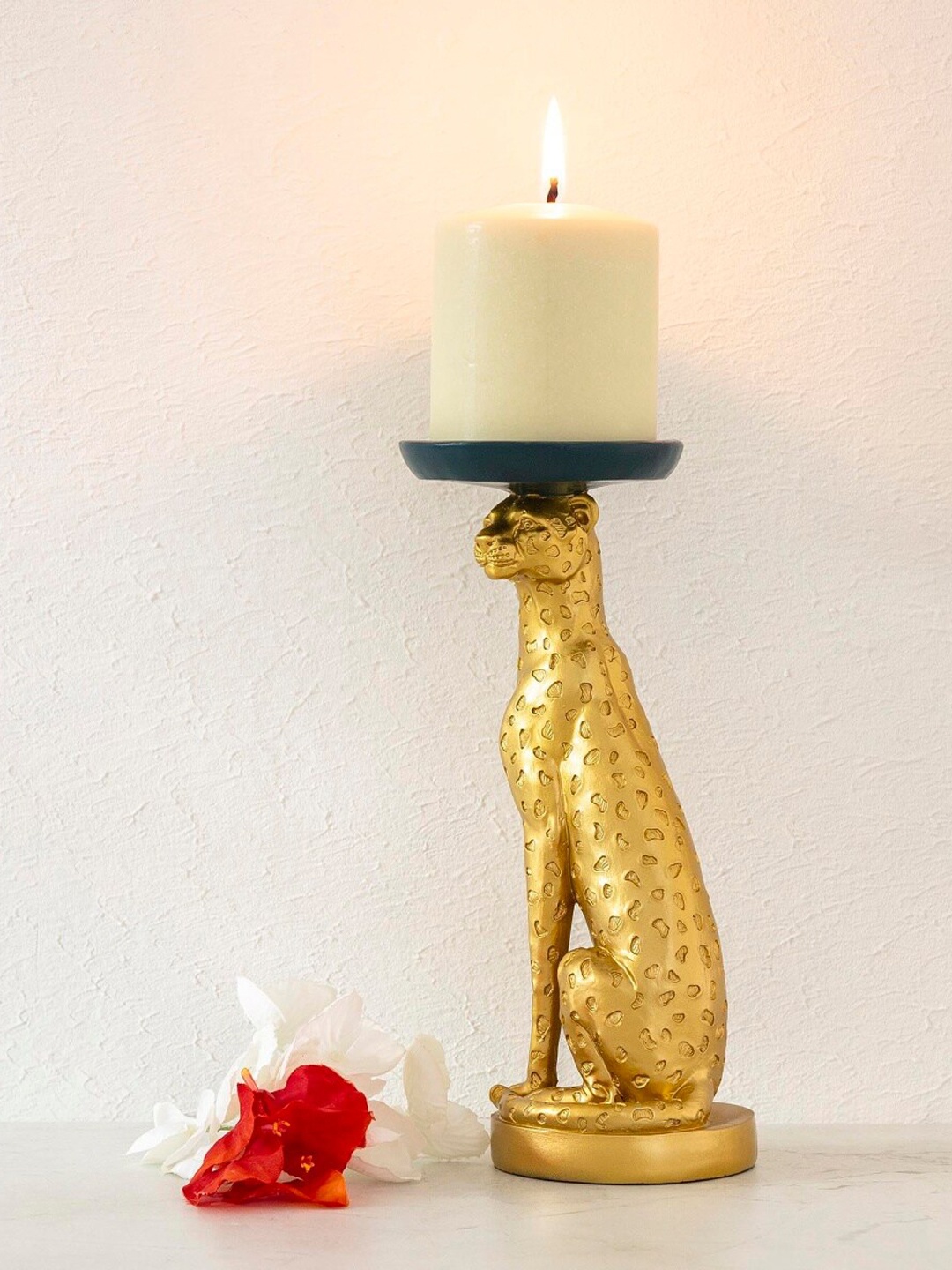 

Home Centre Gold-Toned & Teal Blue Textured Leopard Polyresin Candle Holder