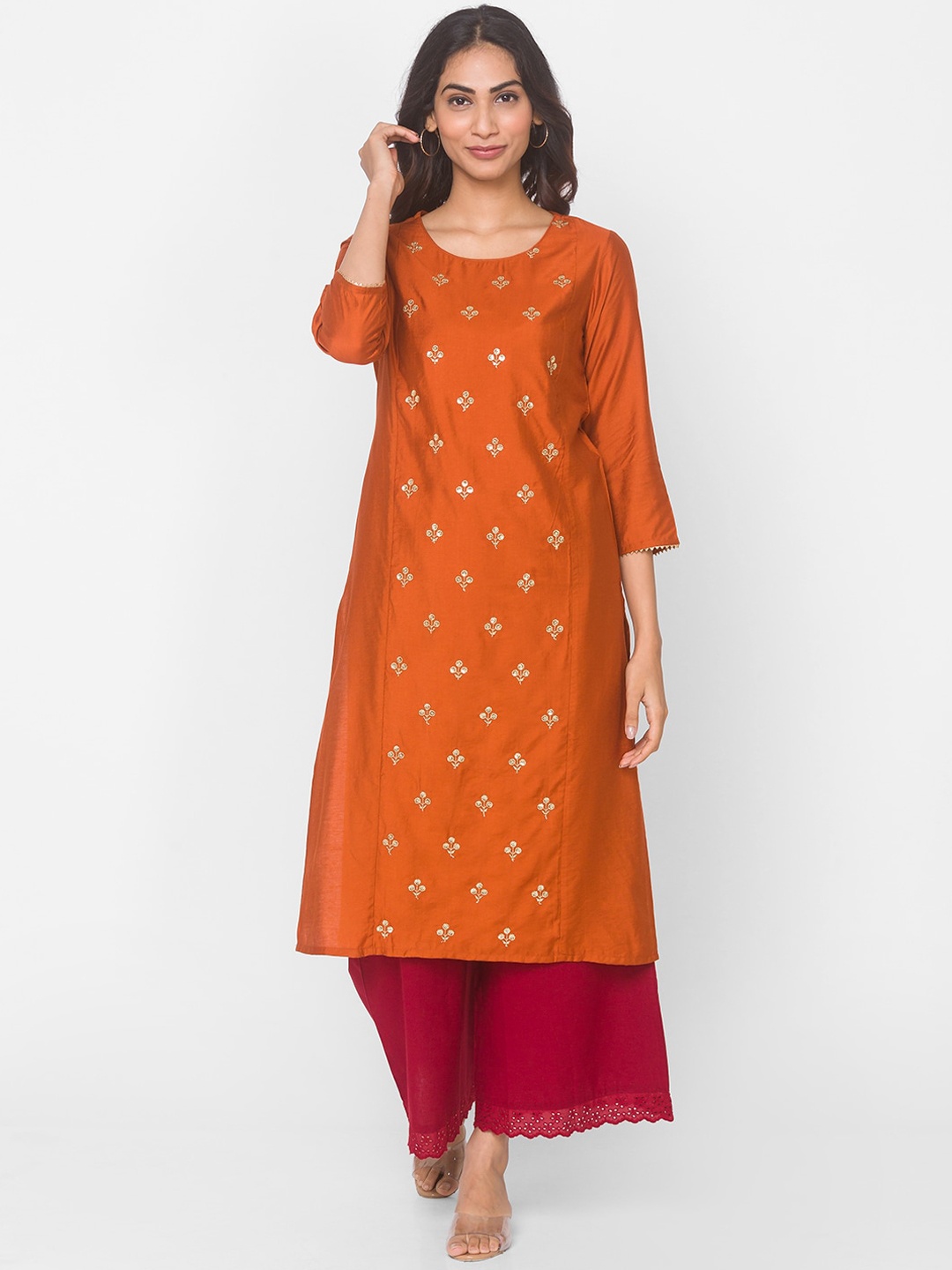 

Ethnicity Women Orange & Gold Ethnic Motifs Thread Work Kurta