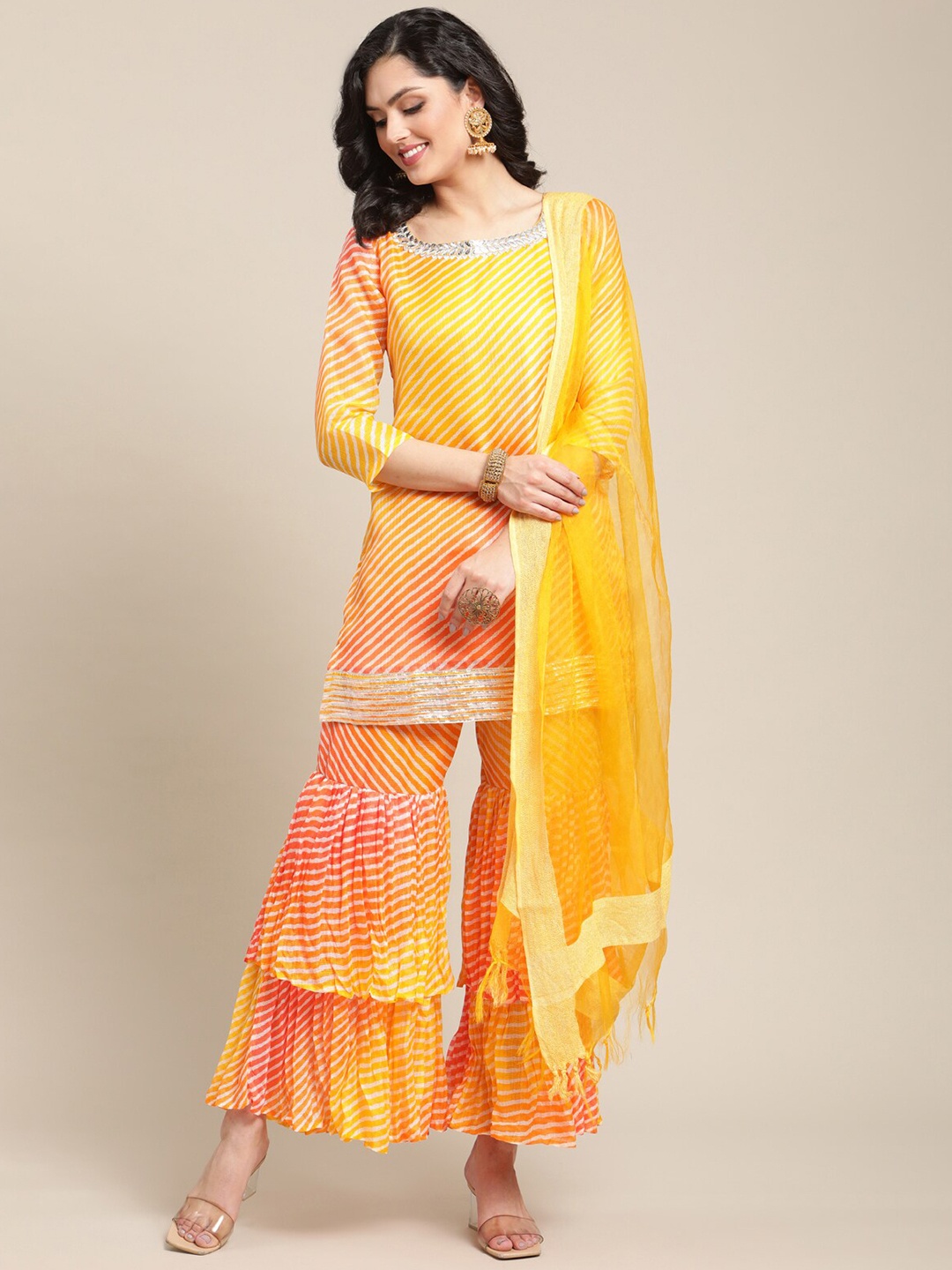 

Varanga Women Yellow Printed Gotta Patti Kurti with Sharara & Dupatta