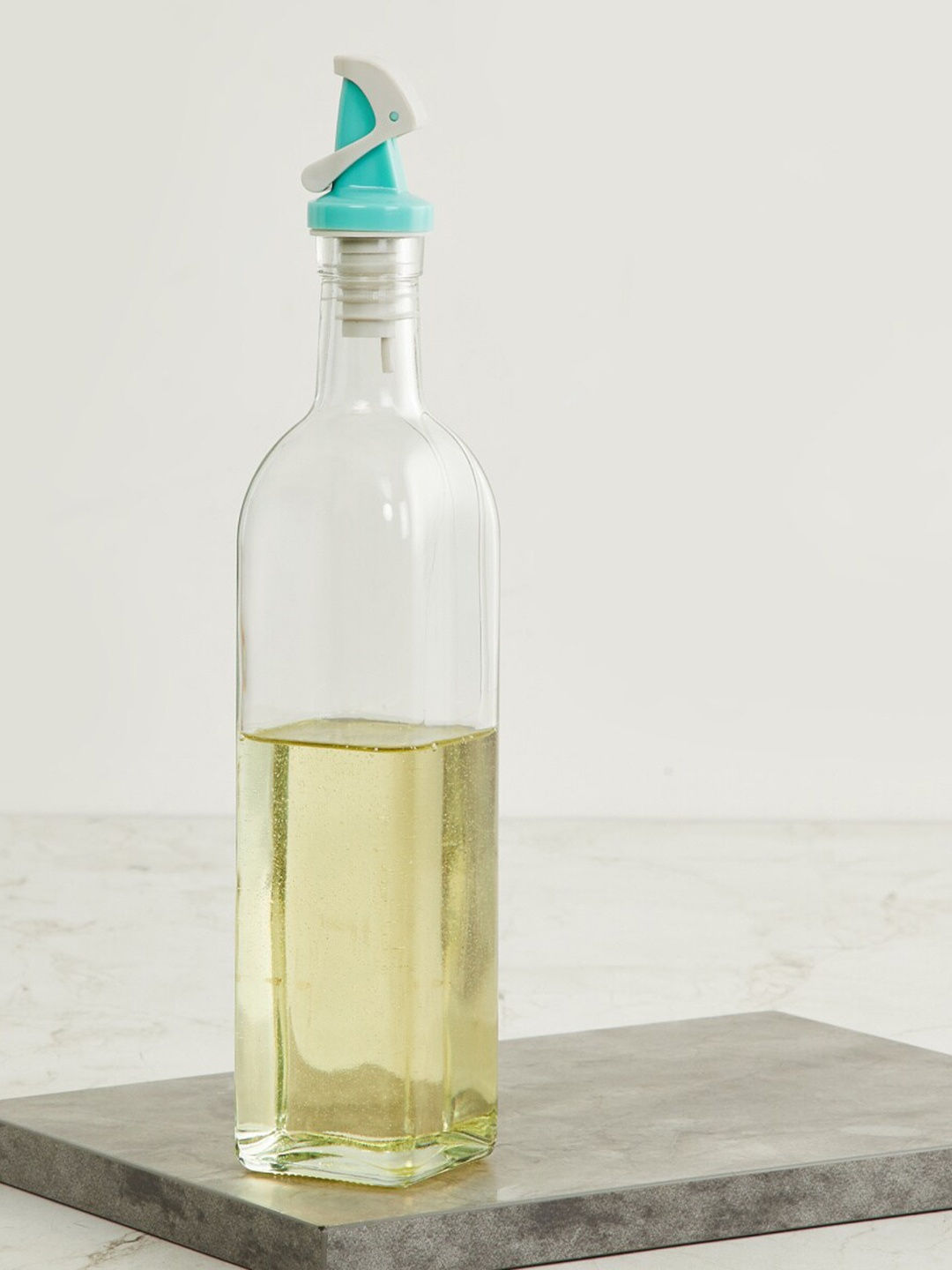 

Home Centre Transparent Solid Oil Dispenser with Gravity Lid