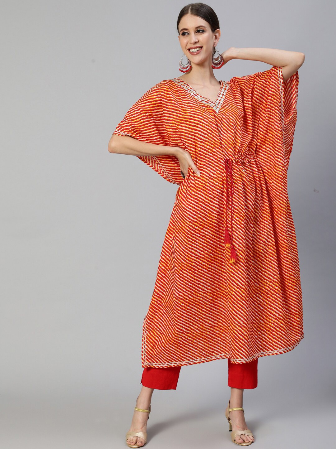 

Ishin Women Orange Ethnic Motifs Printed Kaftan Kurta with Trousers