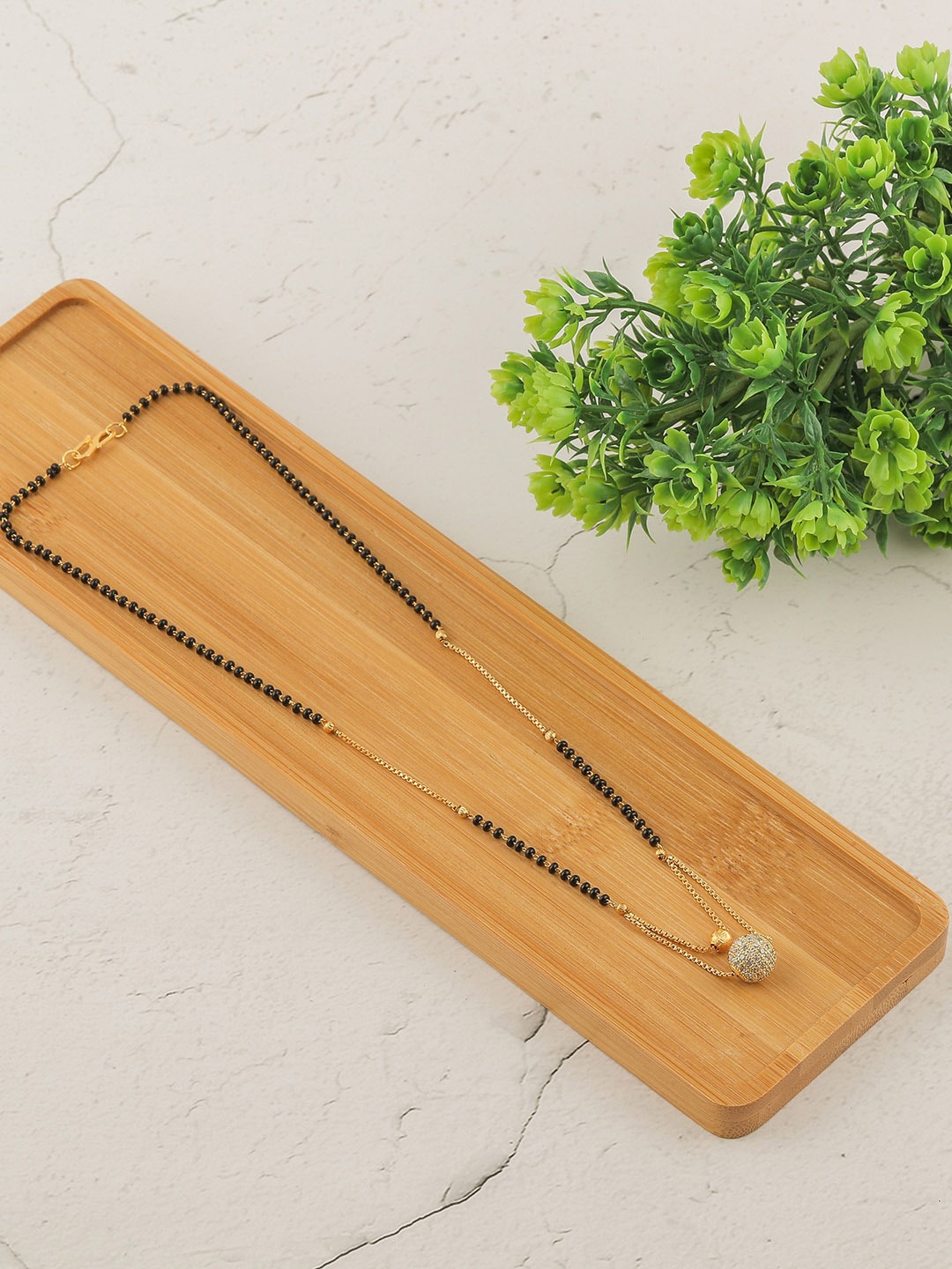 

Brandsoon Set Of 2 Gold-Plated White Stone Studded Black Beaded Mangalsutra