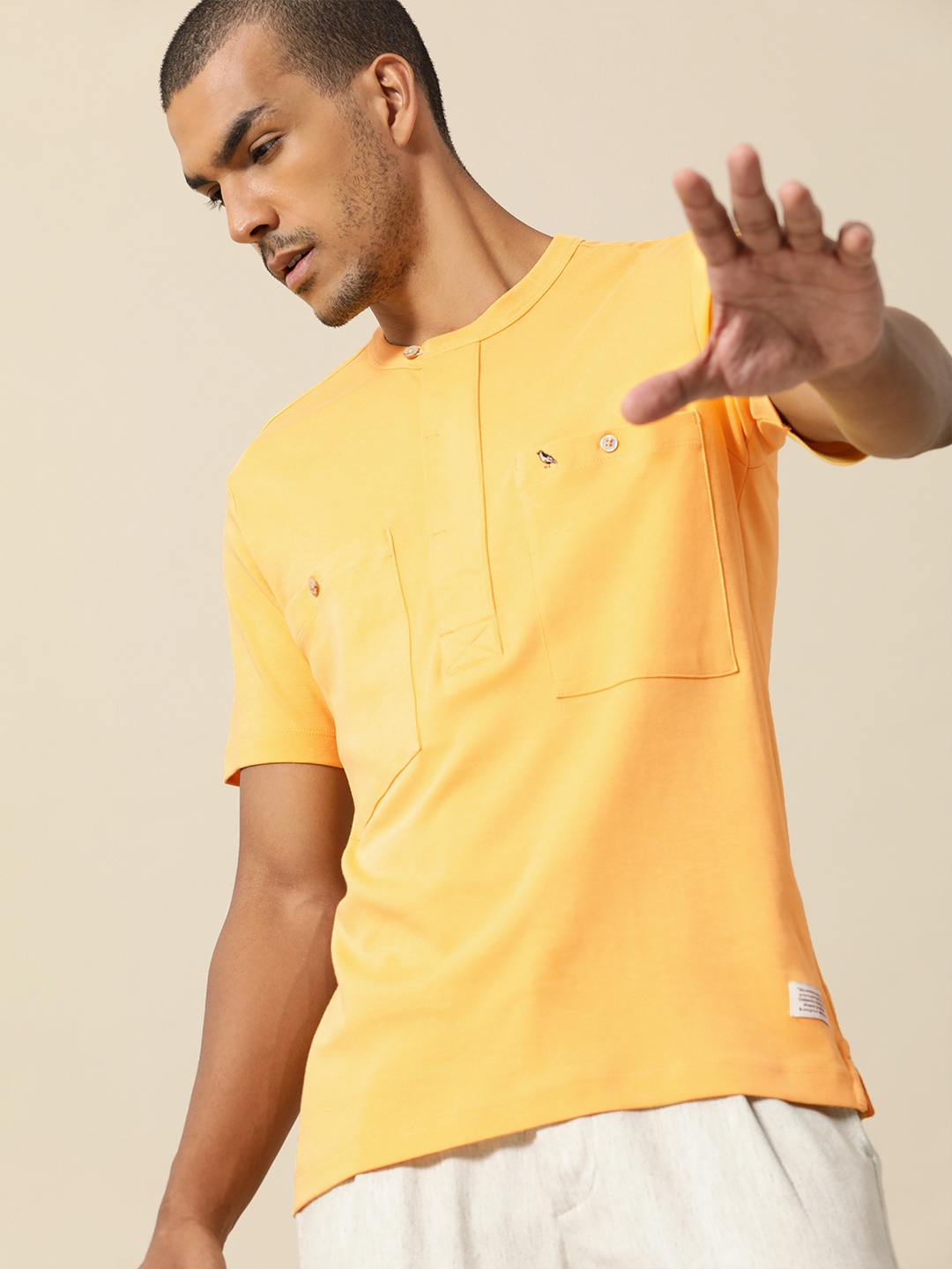 

Mr Bowerbird Men Yellow Solid Pure Cotton T-shirt