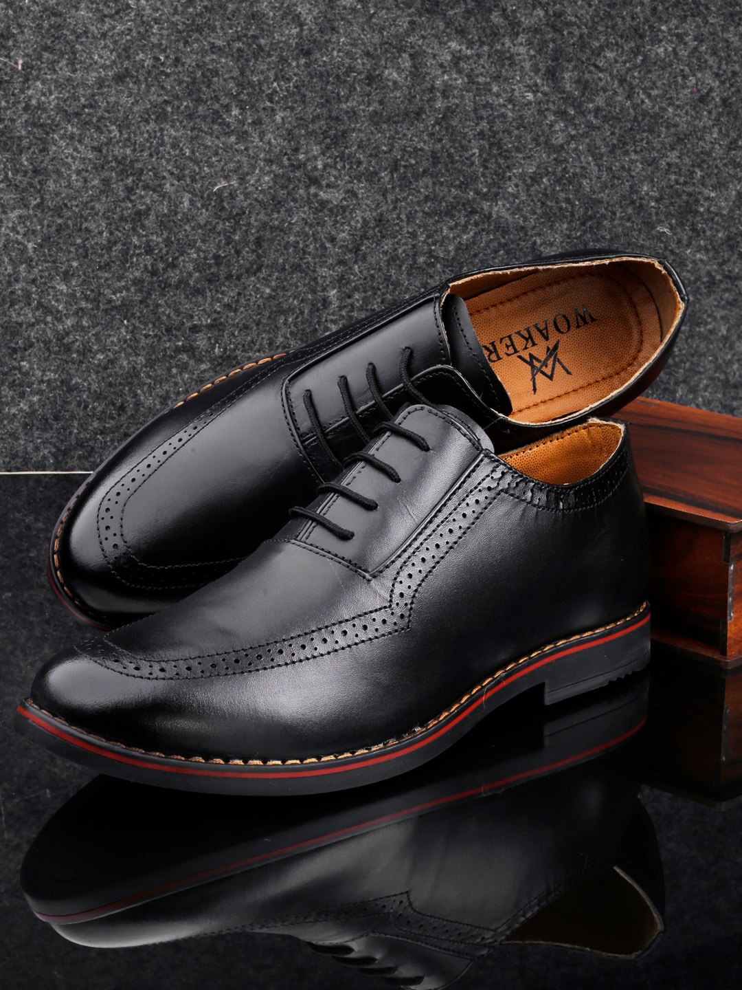 

Woakers Men Black Solid Leather Formal Oxfords