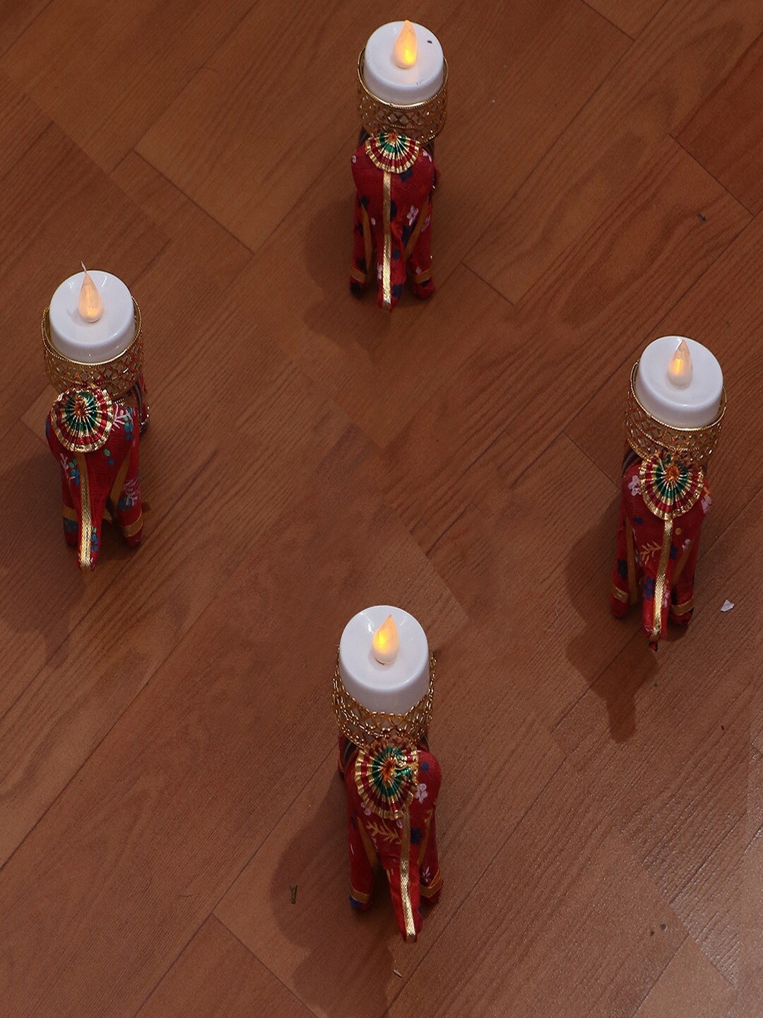 

PASSION PETALS Set Of 4 Red & Orange Elephant Candle Holders