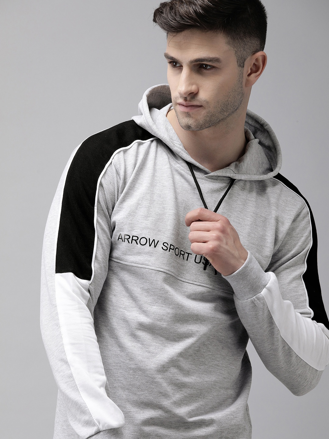 

Arrow Men Grey Melange Hooded Sweatshirt with Colourblocked Sleeves