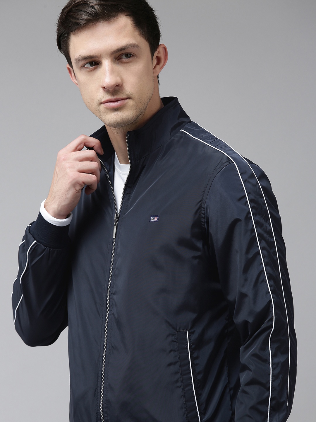 

Arrow Men Navy Blue Solid Sporty Jacket
