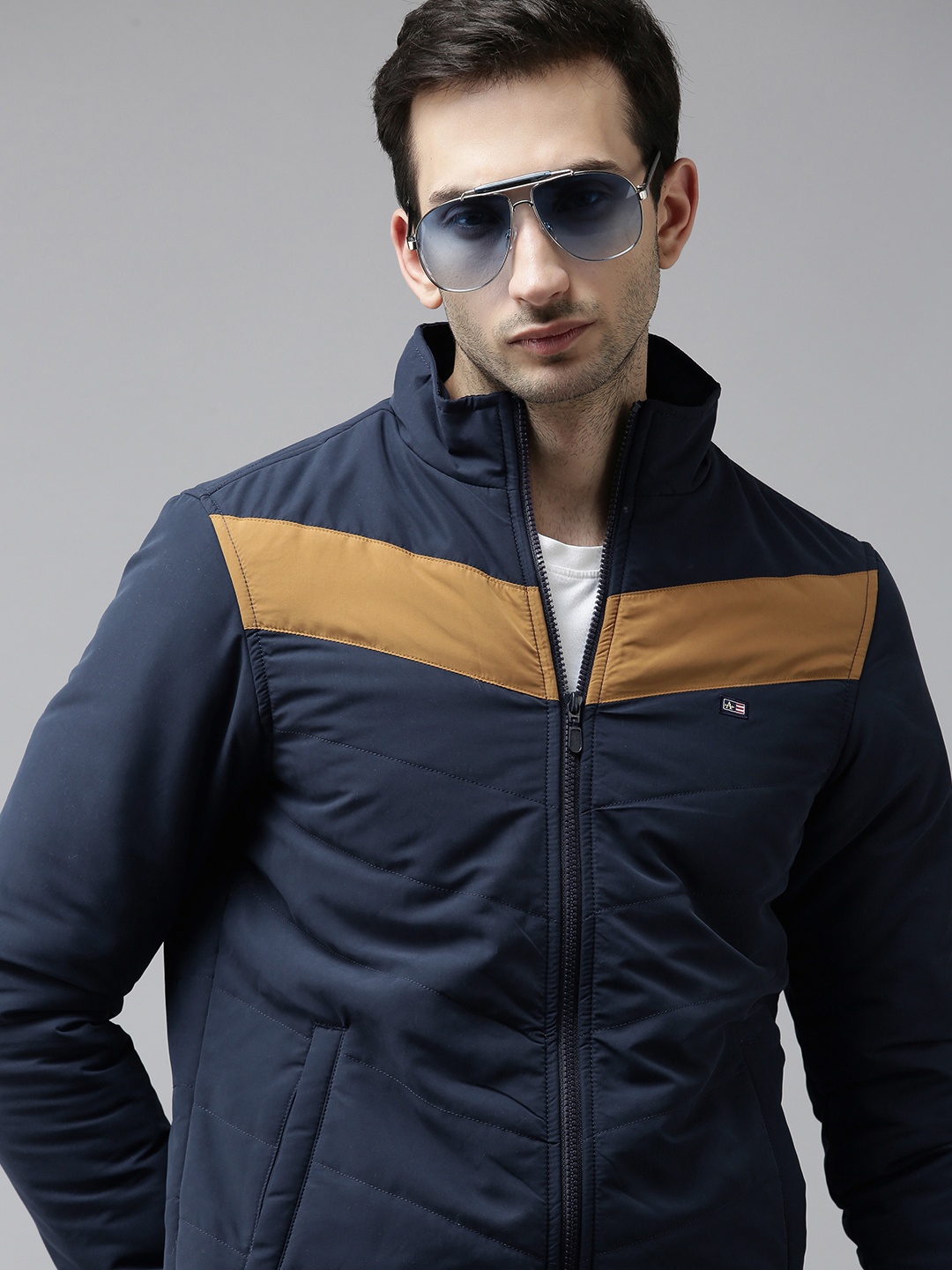 

Arrow Men Navy Blue & Brown Colourblocked Padded Jacket