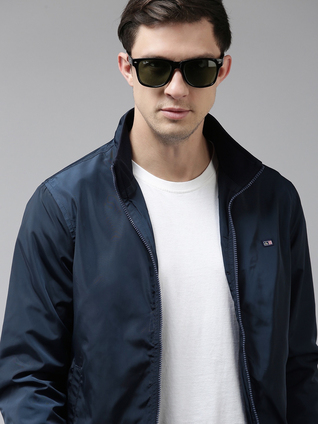 

Arrow Men Blue Solid Sporty Jacket