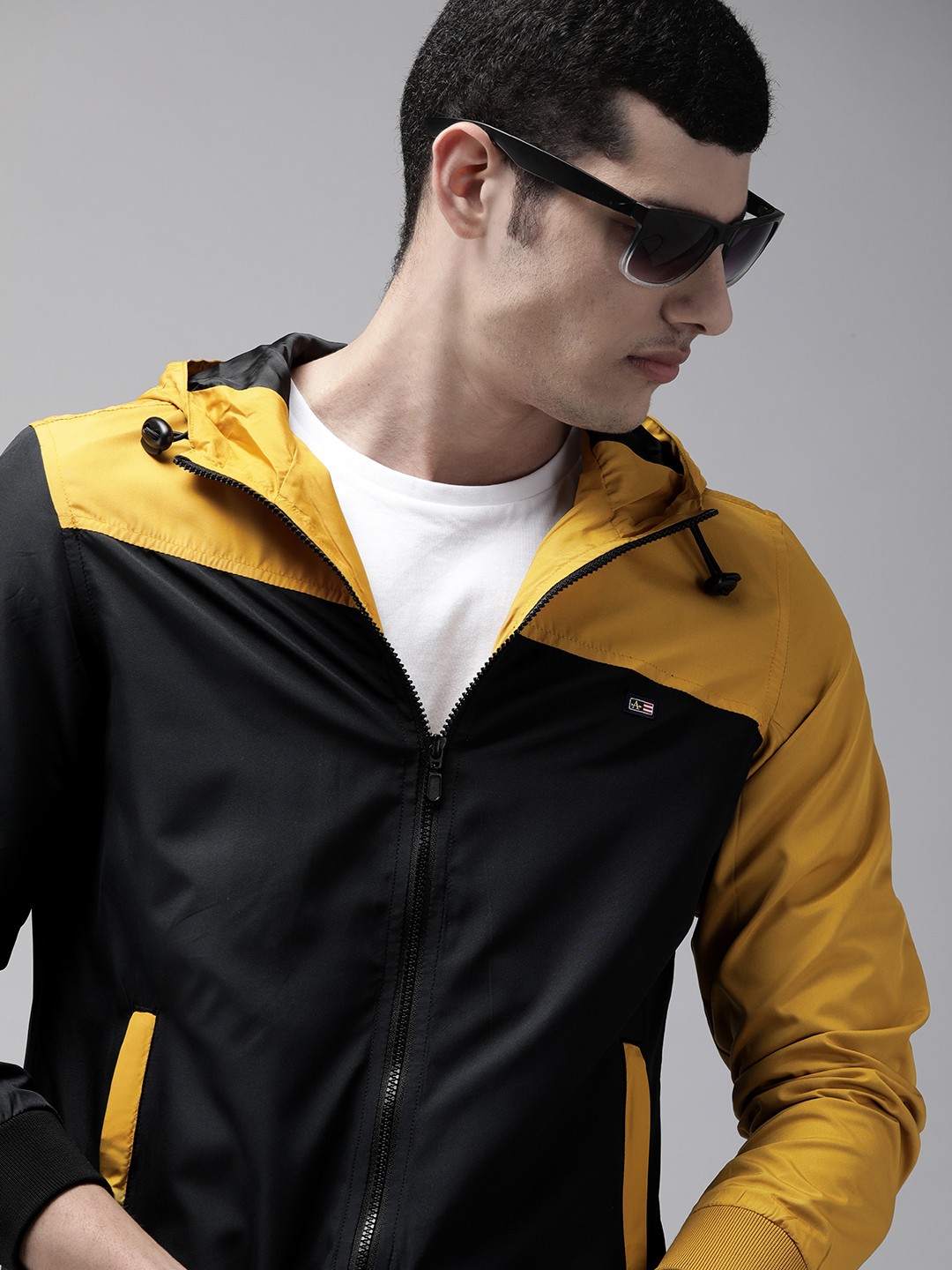 

Arrow Men Black & Yellow Colourblocked Sporty Jacket