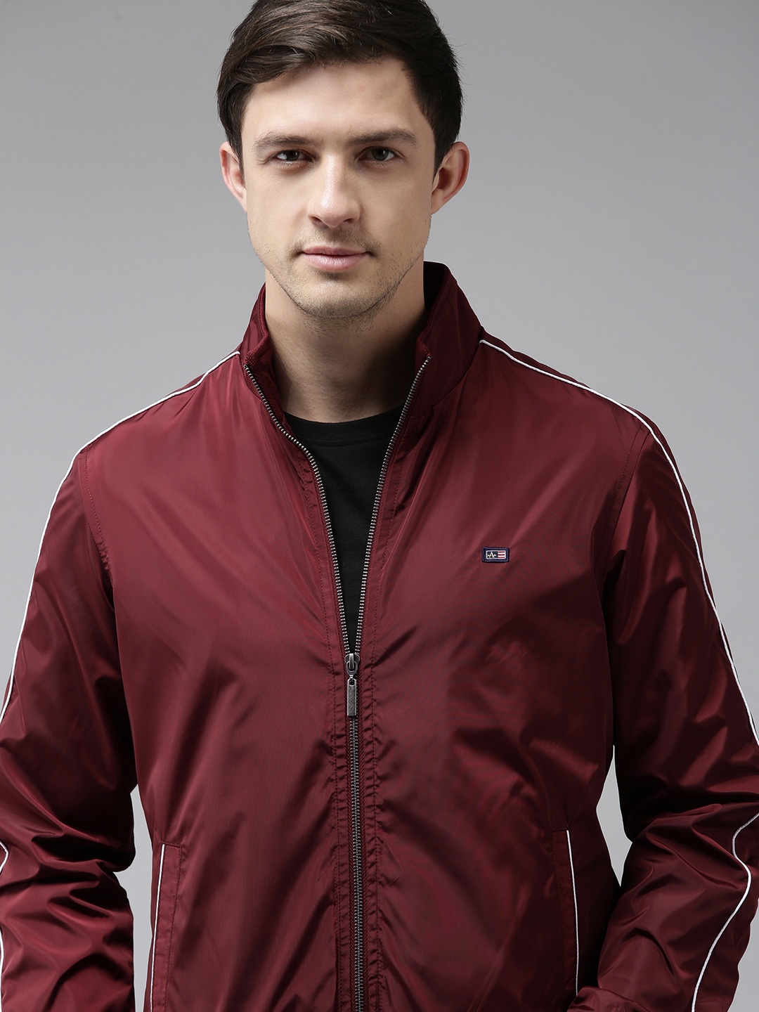

Arrow Men Red Cut And Sew Solid Sporty Jacket