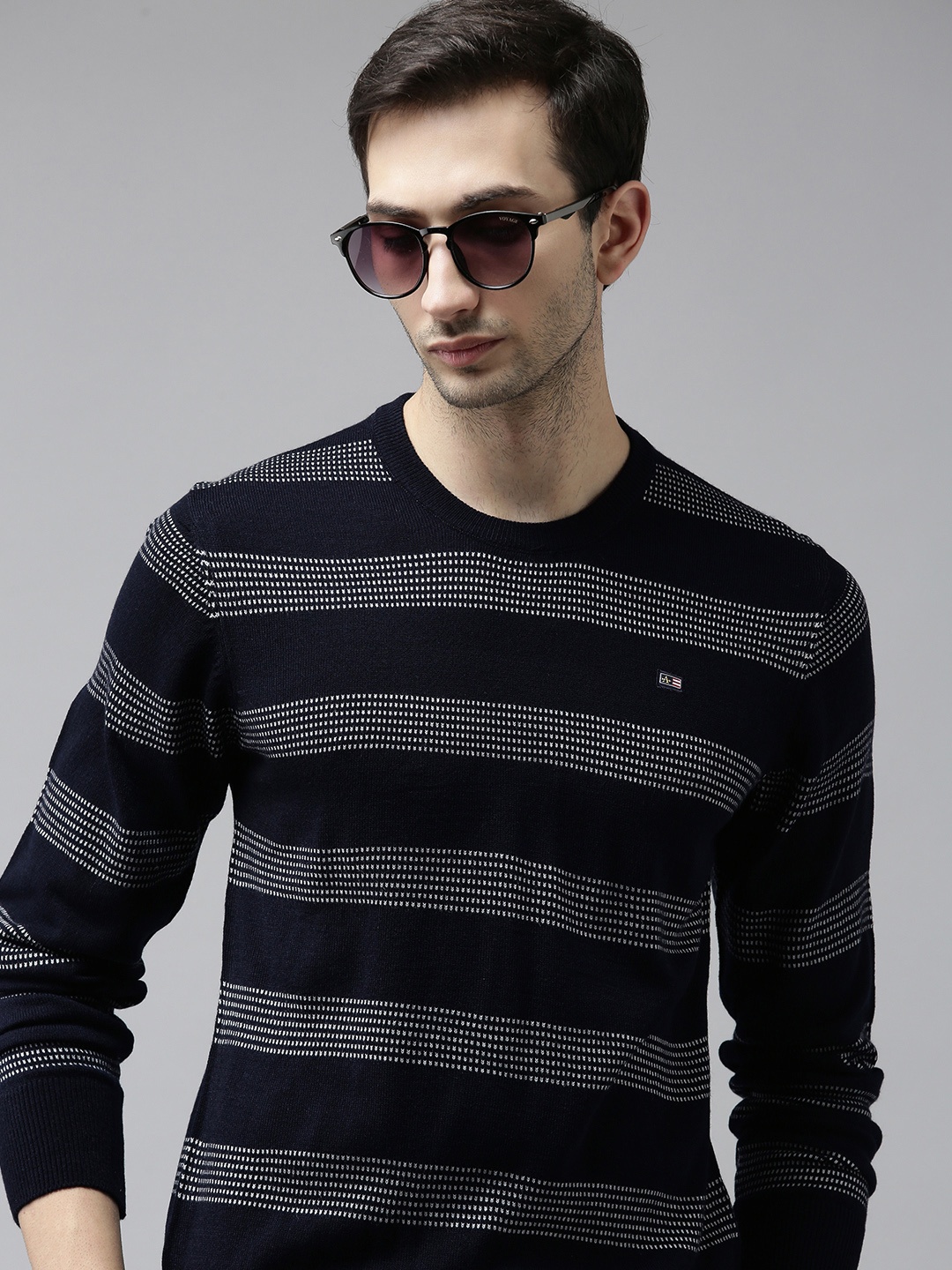 

Arrow Men Navy Blue & White Striped Pullover Sweater