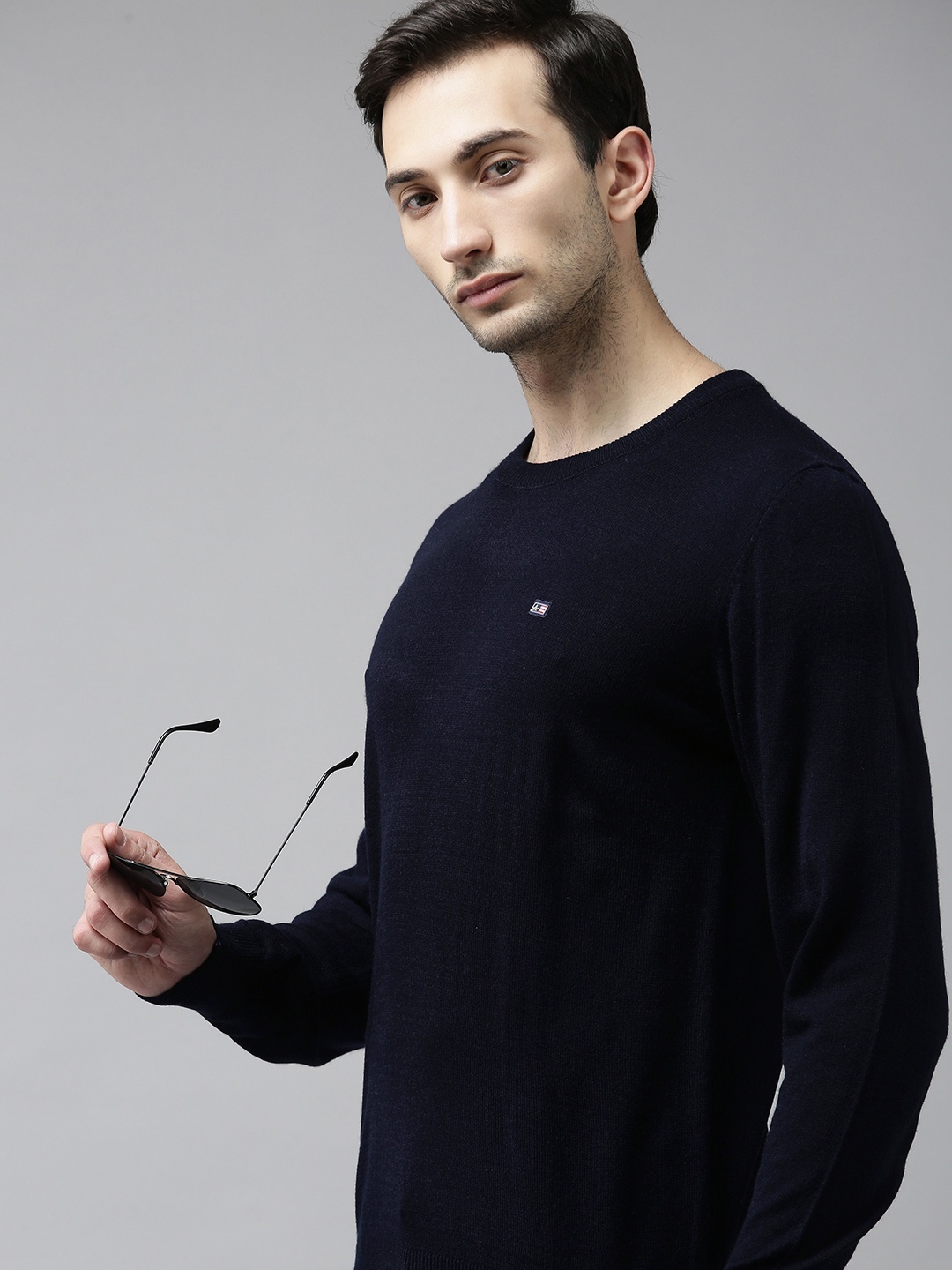 

Arrow Men Navy Blue Solid Round-Neck Pullover Sweater