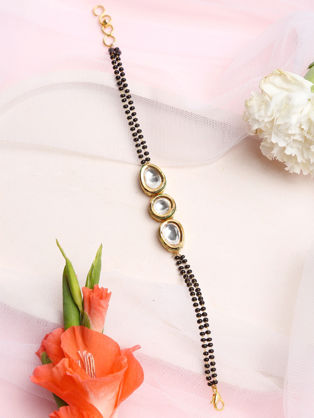 

Ruby Raang Women Gold-Plated & Black Beaded Kundan Mangalsutra Bracelet