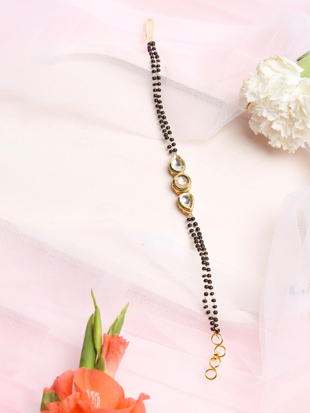 

Ruby Raang Black & Gold-Toned Kundan Bracelet Mangalsutra