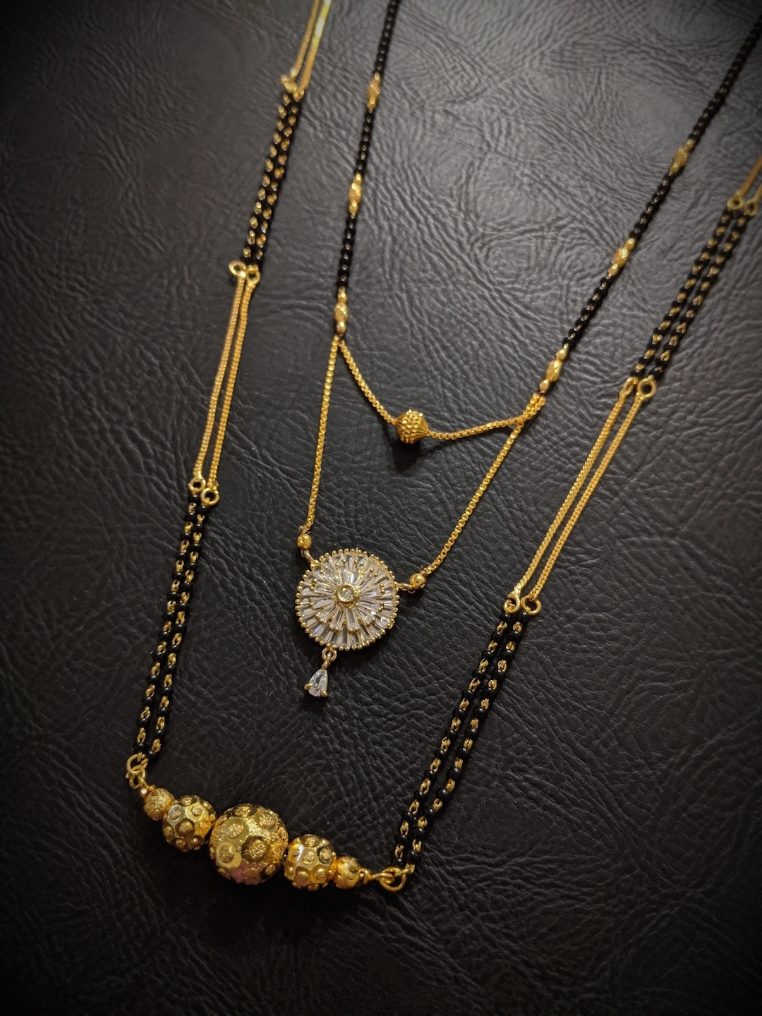 

Digital Dress Room Set Of 2 Gold-Plated White & Black Beaded Mangalsutras