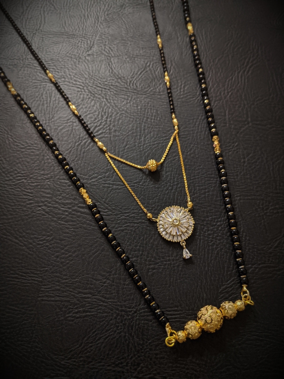 

Digital Dress Room Set Of 2 Gold-Plated White & Black Beaded Mangalsutra