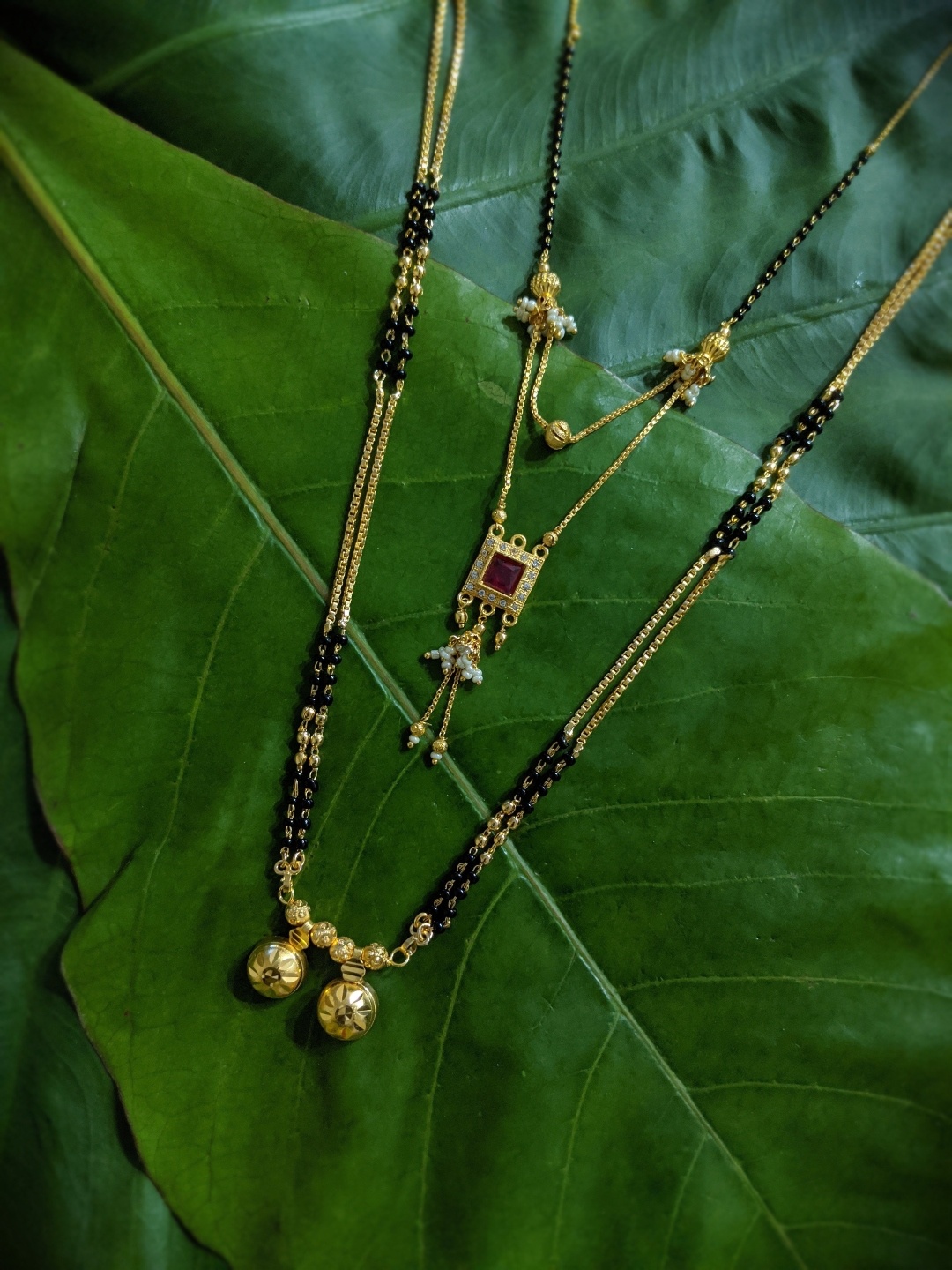 

Digital Dress Room Set of 2 Gold Plated Stone Studded and Black Beaded Mangalsutra