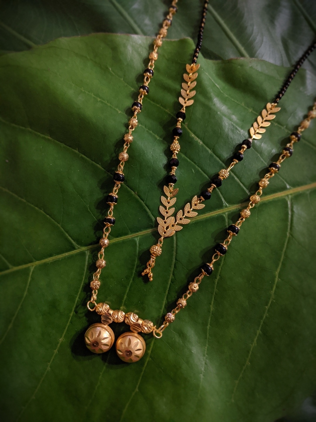 

Digital Dress Room Set Of 2 Gold-Plated Black Beaded Mangalsutras